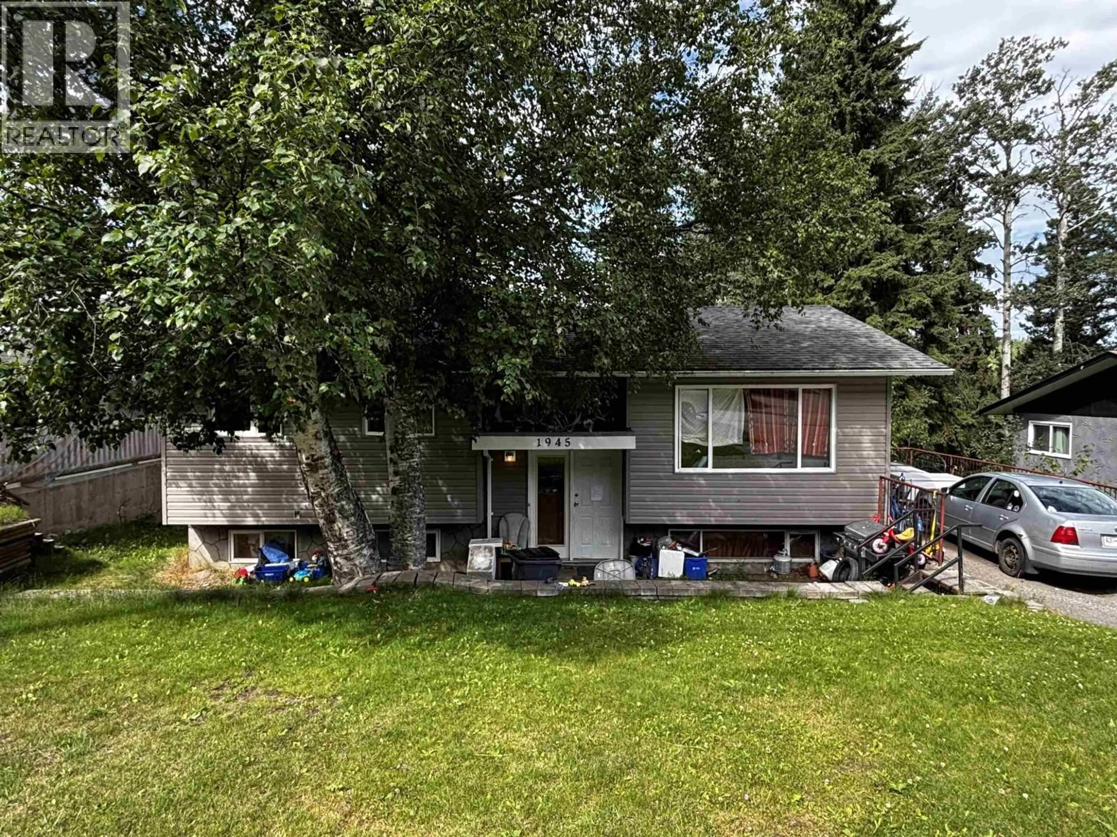 A pic from outside/outdoor area/front of a property/back of a property/a pic from drone, street for 1945 MCANDREW CRESCENT, Prince George British Columbia V2K1J9