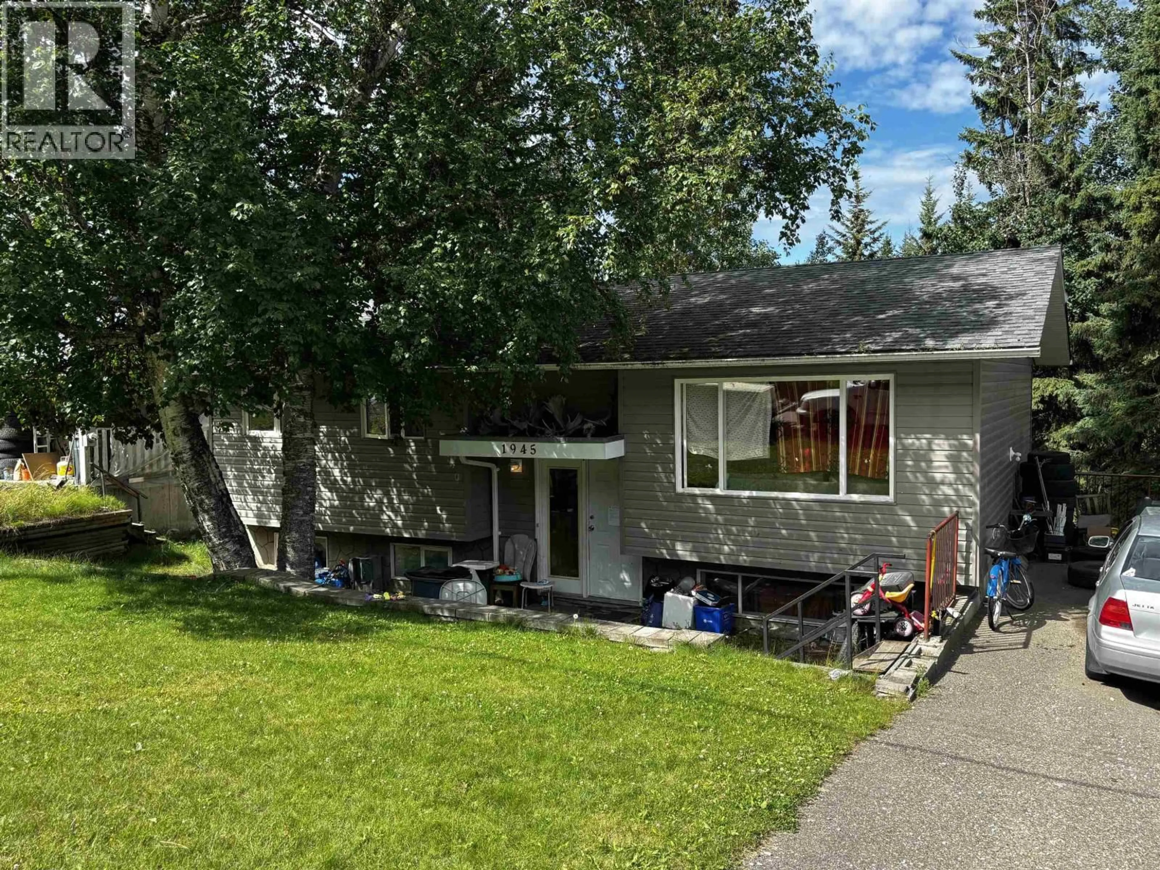 Home with vinyl exterior material, street for 1945 MCANDREW CRESCENT, Prince George British Columbia V2K1J9
