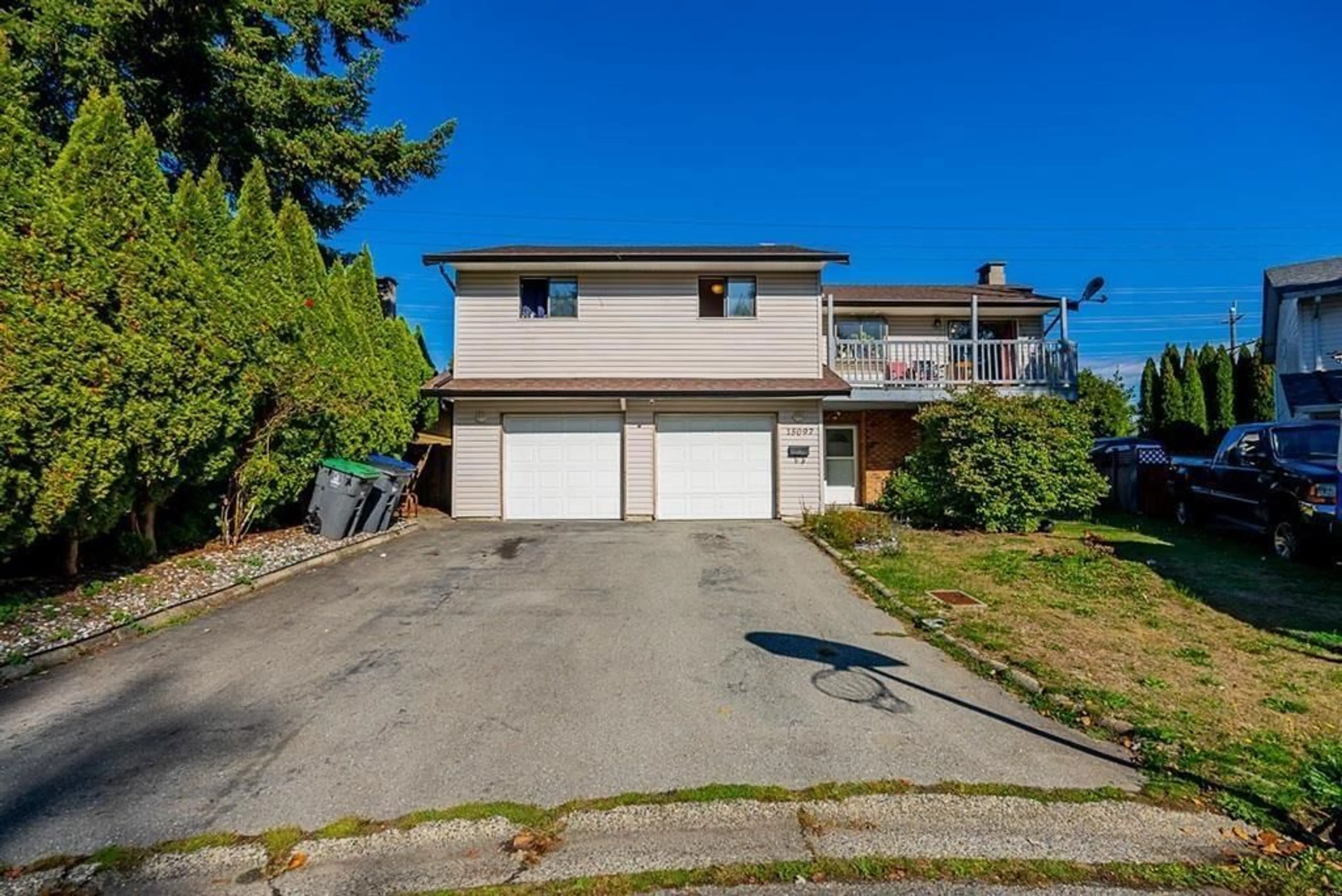 A pic from outside/outdoor area/front of a property/back of a property/a pic from drone, street for 15097 95 AVENUE, Surrey British Columbia V3R7S3
