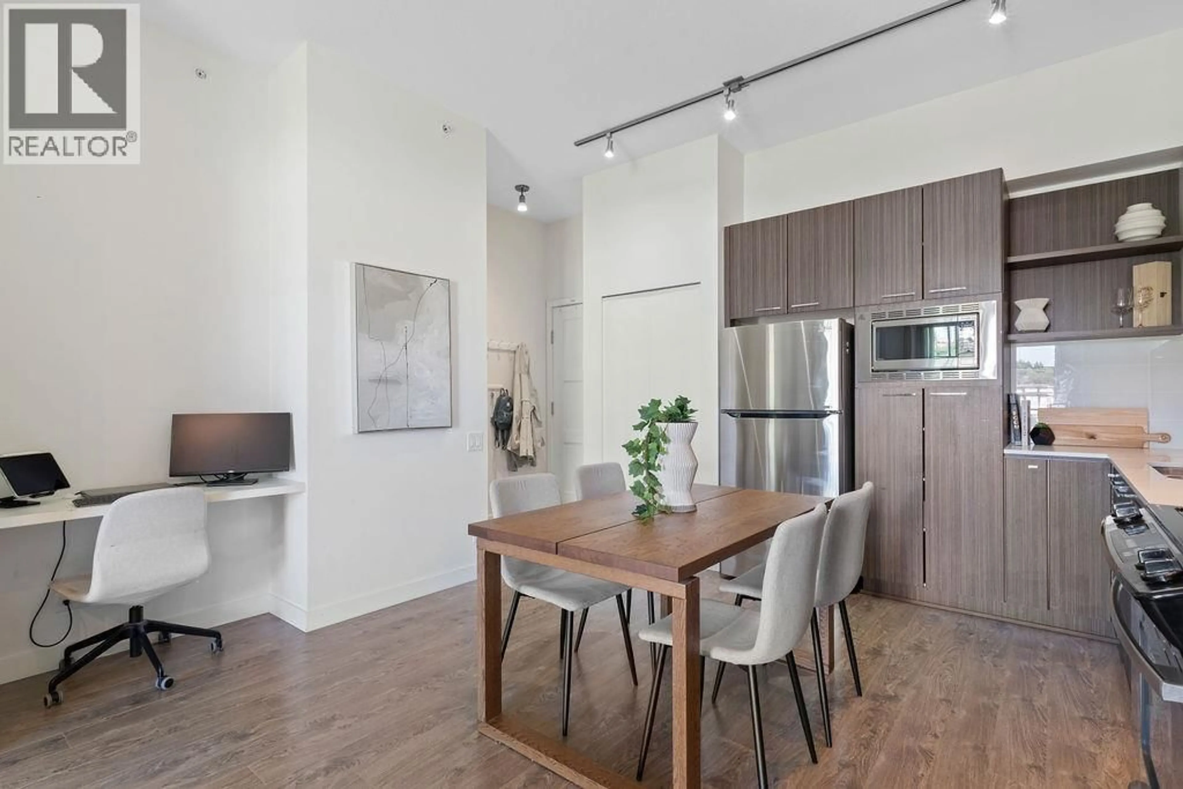 Open concept kitchen, wood/laminate floor for 408 - 555 FOSTER AVENUE, Coquitlam British Columbia V3J0B6