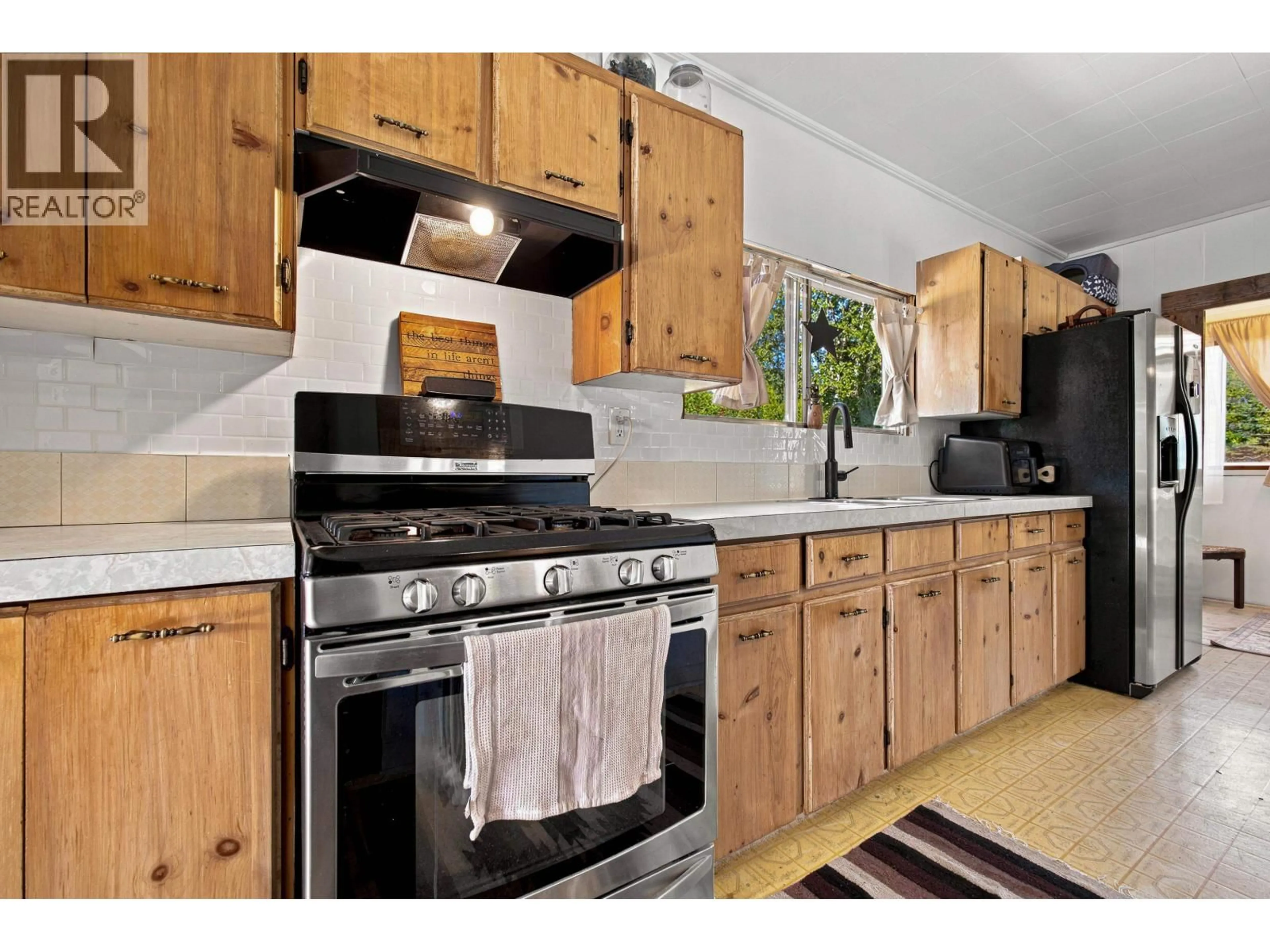Standard kitchen, wood/laminate floor for 144 CEDARVALE FERRY ROAD, Terrace British Columbia V0J1G0