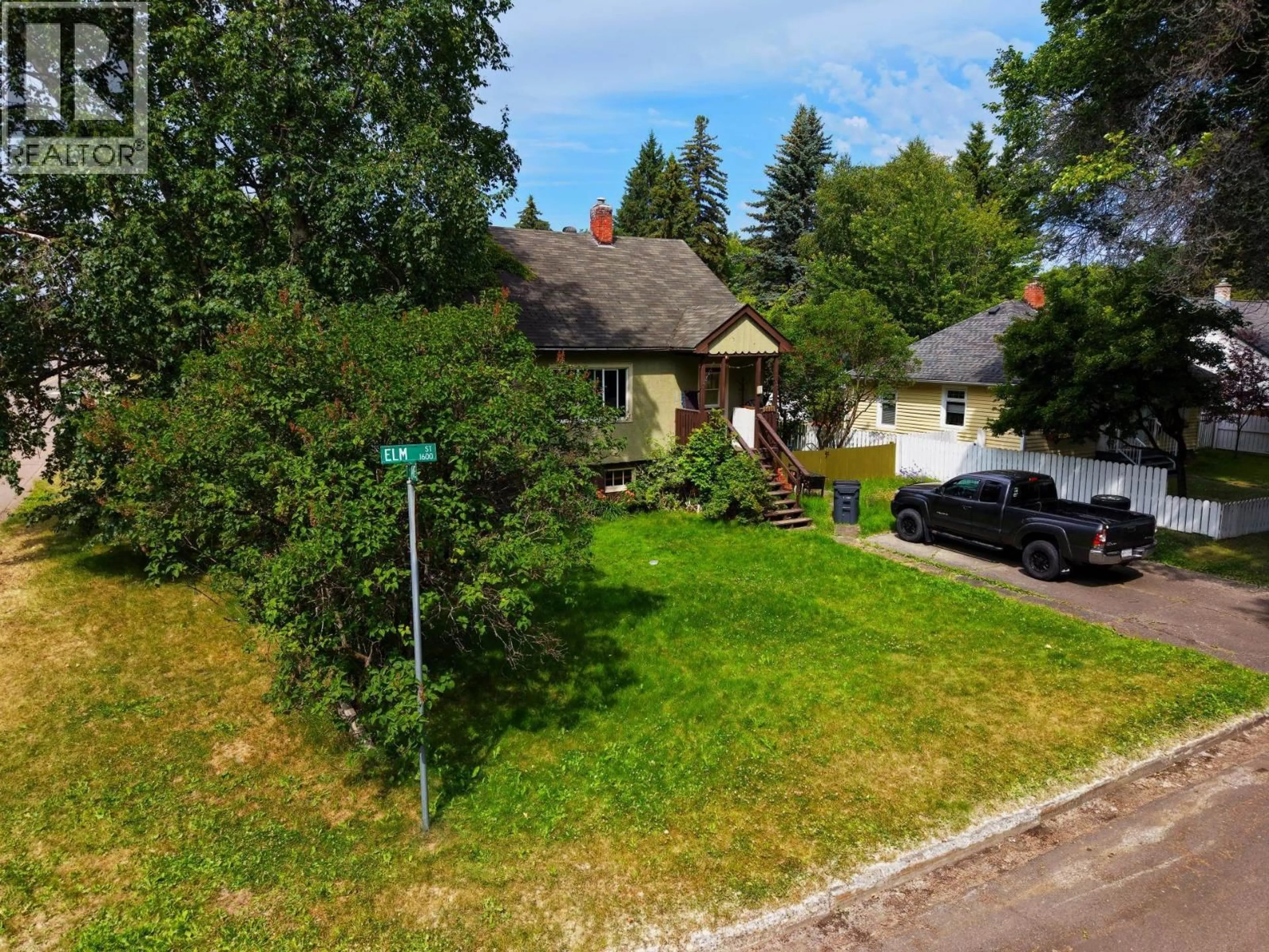 A pic from outside/outdoor area/front of a property/back of a property/a pic from drone, street for 1685 ELM STREET, Prince George British Columbia V2L1C7