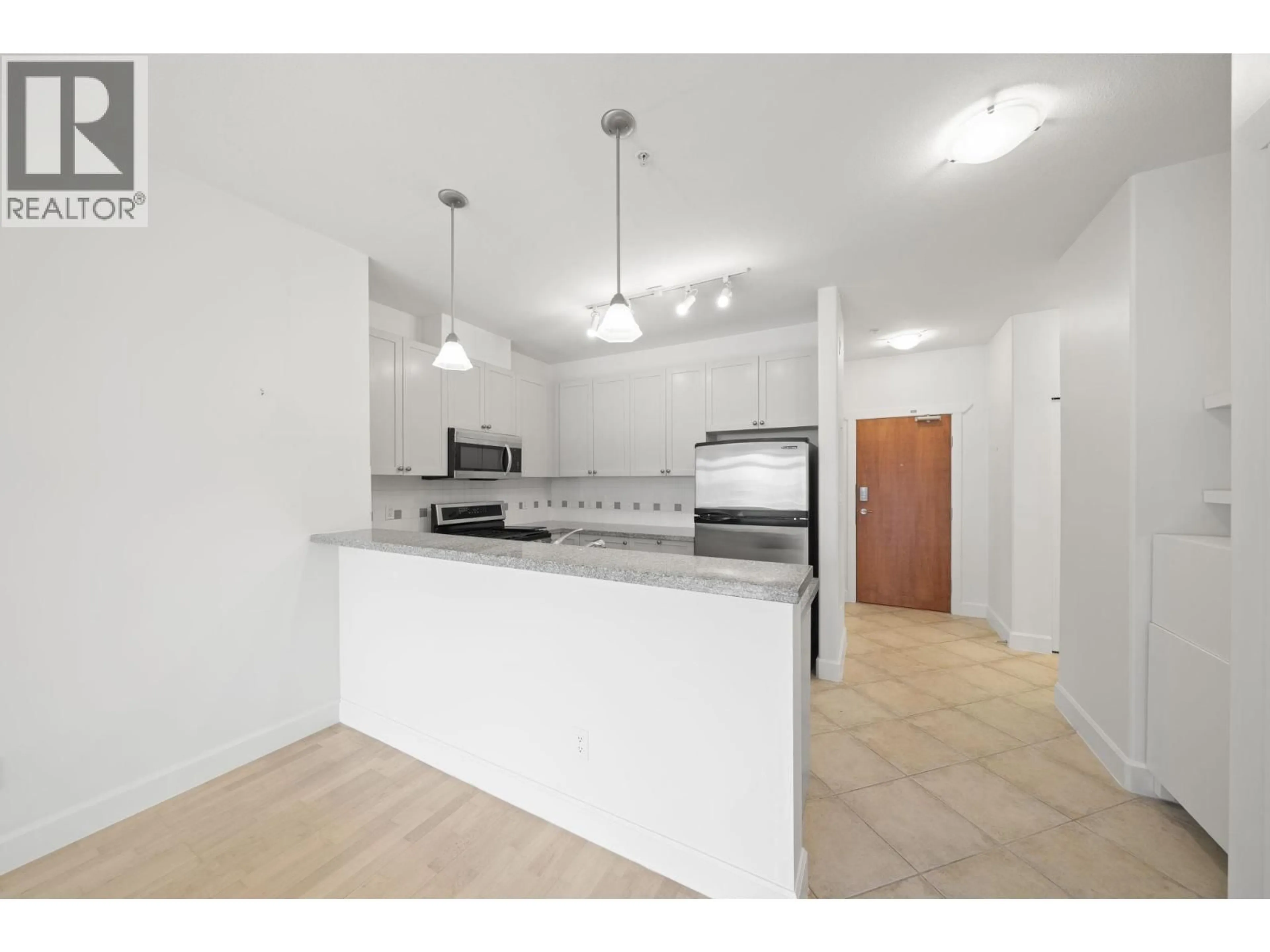Standard kitchen, unknown for 206 - 4211 BAYVIEW STREET, Richmond British Columbia V7E6T6