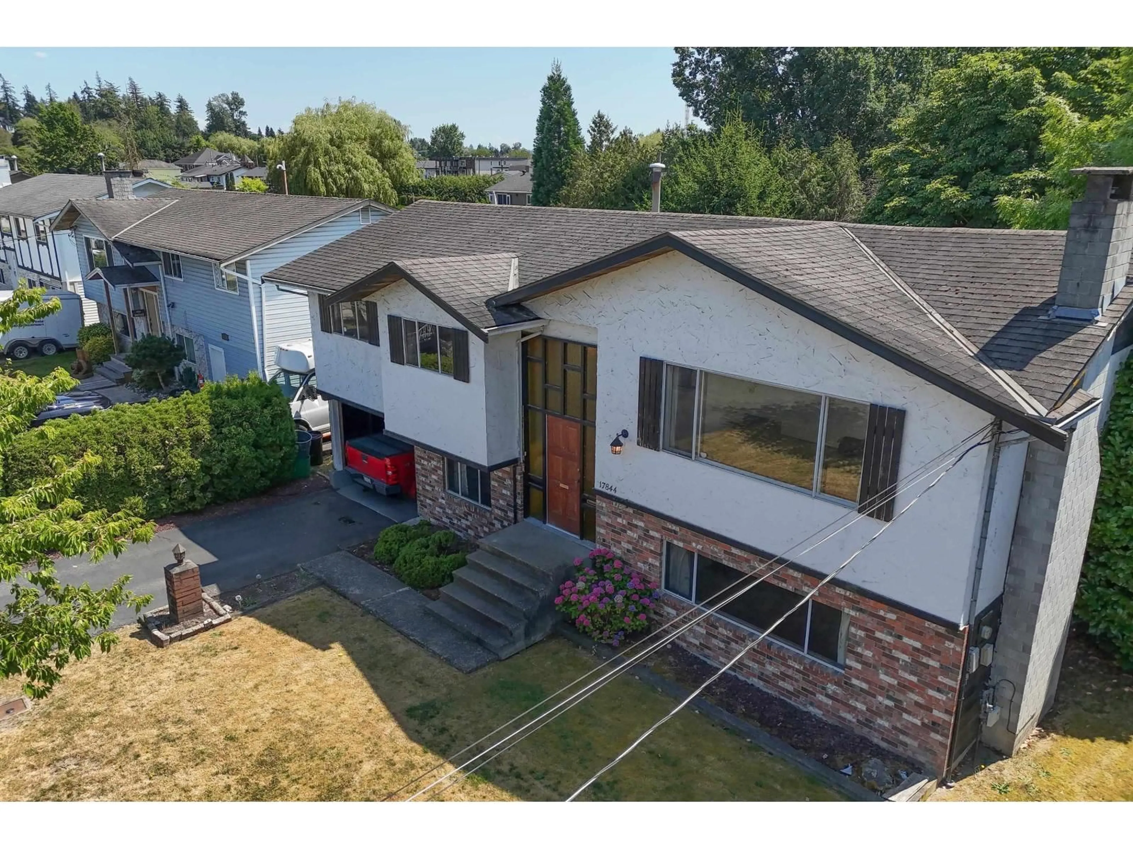 A pic from outside/outdoor area/front of a property/back of a property/a pic from drone, street for 17844 57A AVENUE, Surrey British Columbia V3S1J4