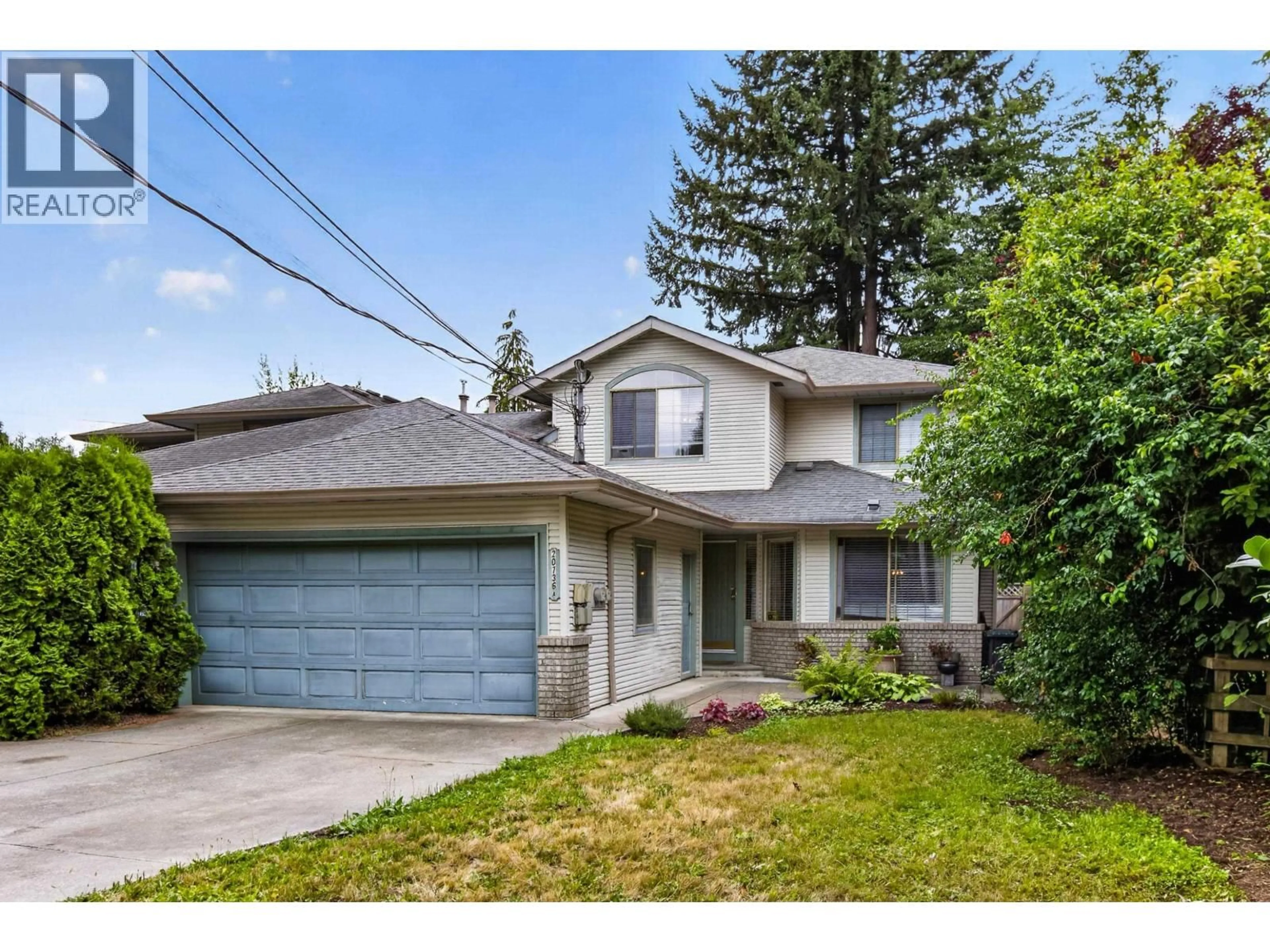 Home with vinyl exterior material, street for A - 20736 RIVER ROAD, Maple Ridge British Columbia V2X1Z7