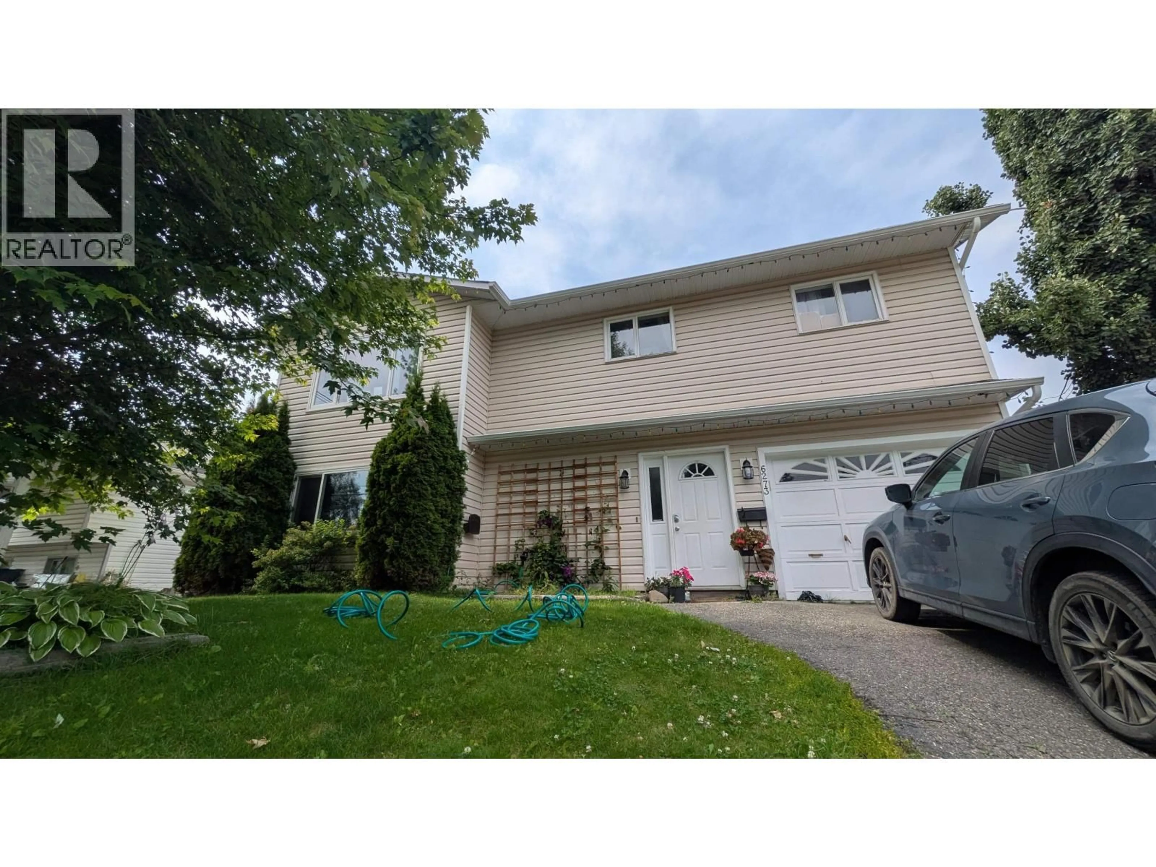 Home with vinyl exterior material, street for 6273 SOUTH KELLY ROAD, Prince George British Columbia V2K2G5