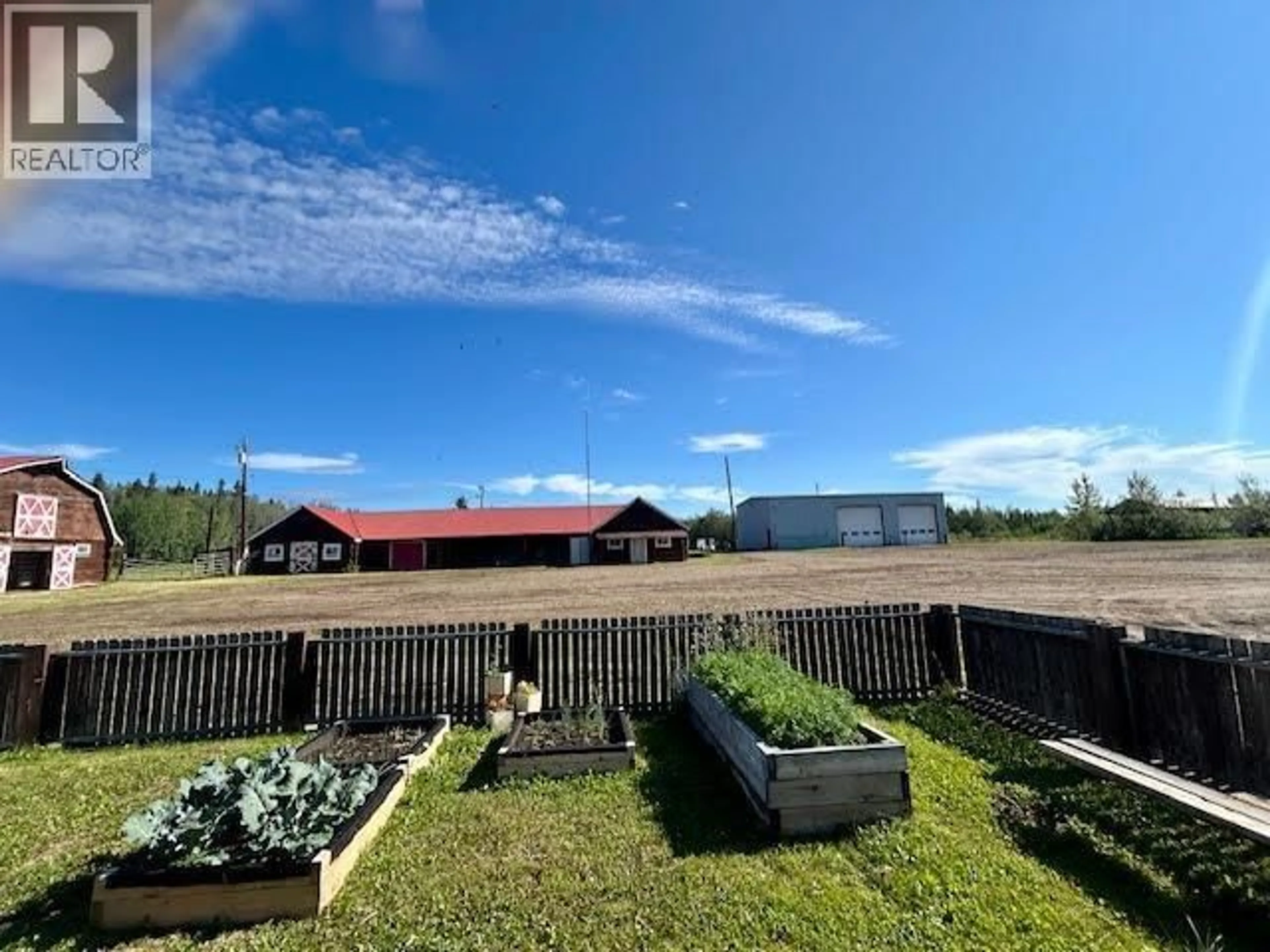 A pic from outside/outdoor area/front of a property/back of a property/a pic from drone, mountain view for 7504 OLD ALASKA HIGHWAY, Fort Nelson British Columbia V0C1R0
