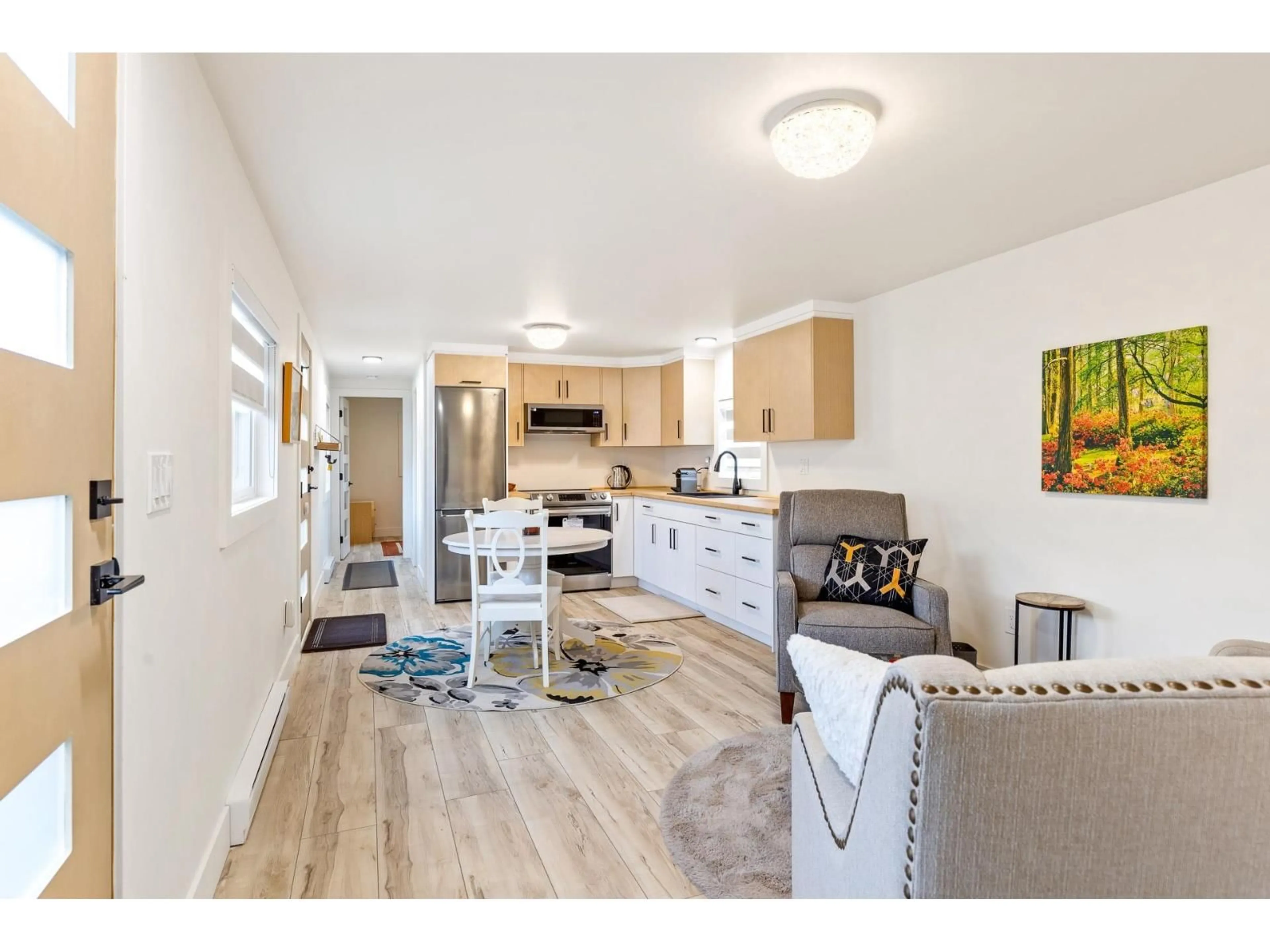 Open concept kitchen, wood/laminate floor for 7 - 8953 SHOOK ROAD, Mission British Columbia V2V5M2