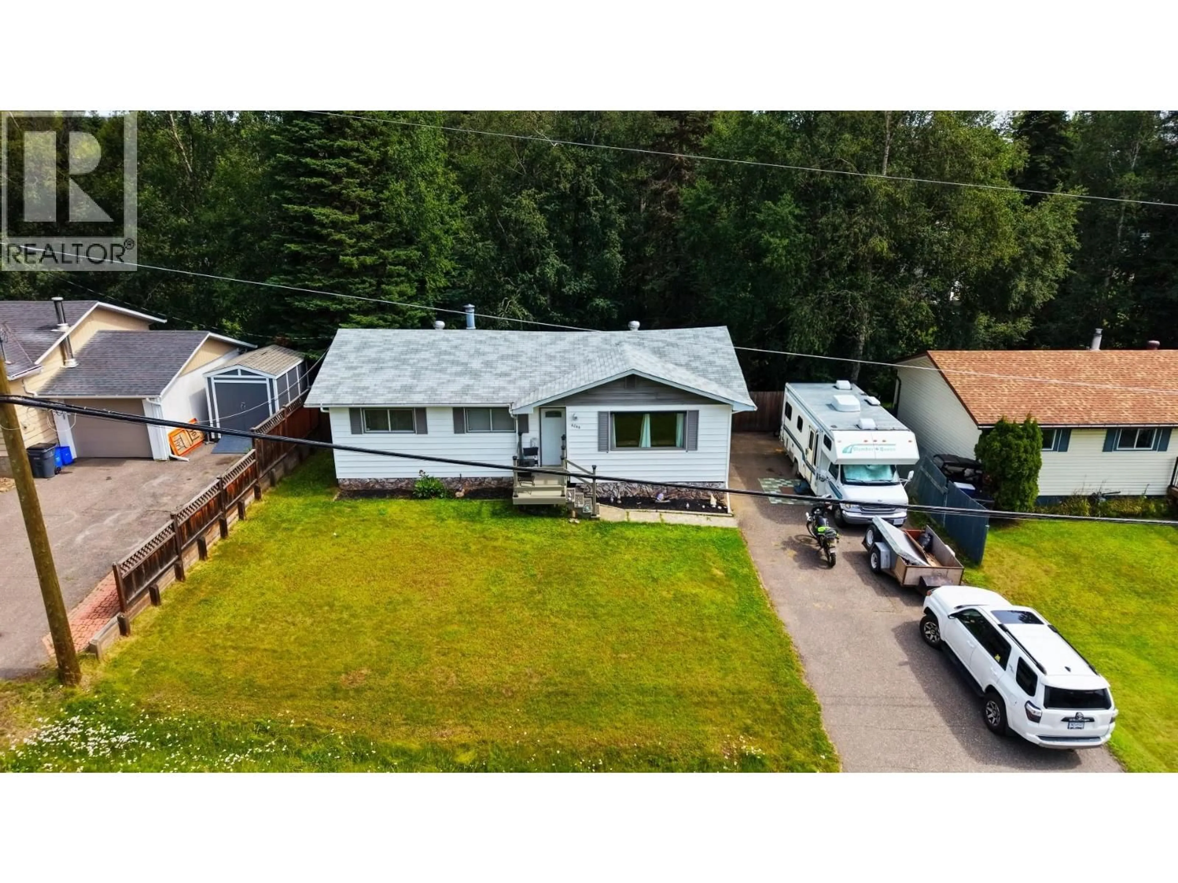 A pic from outside/outdoor area/front of a property/back of a property/a pic from drone, mountain view for 6266 BIRCHWOOD DRIVE, Prince George British Columbia V2K1W2