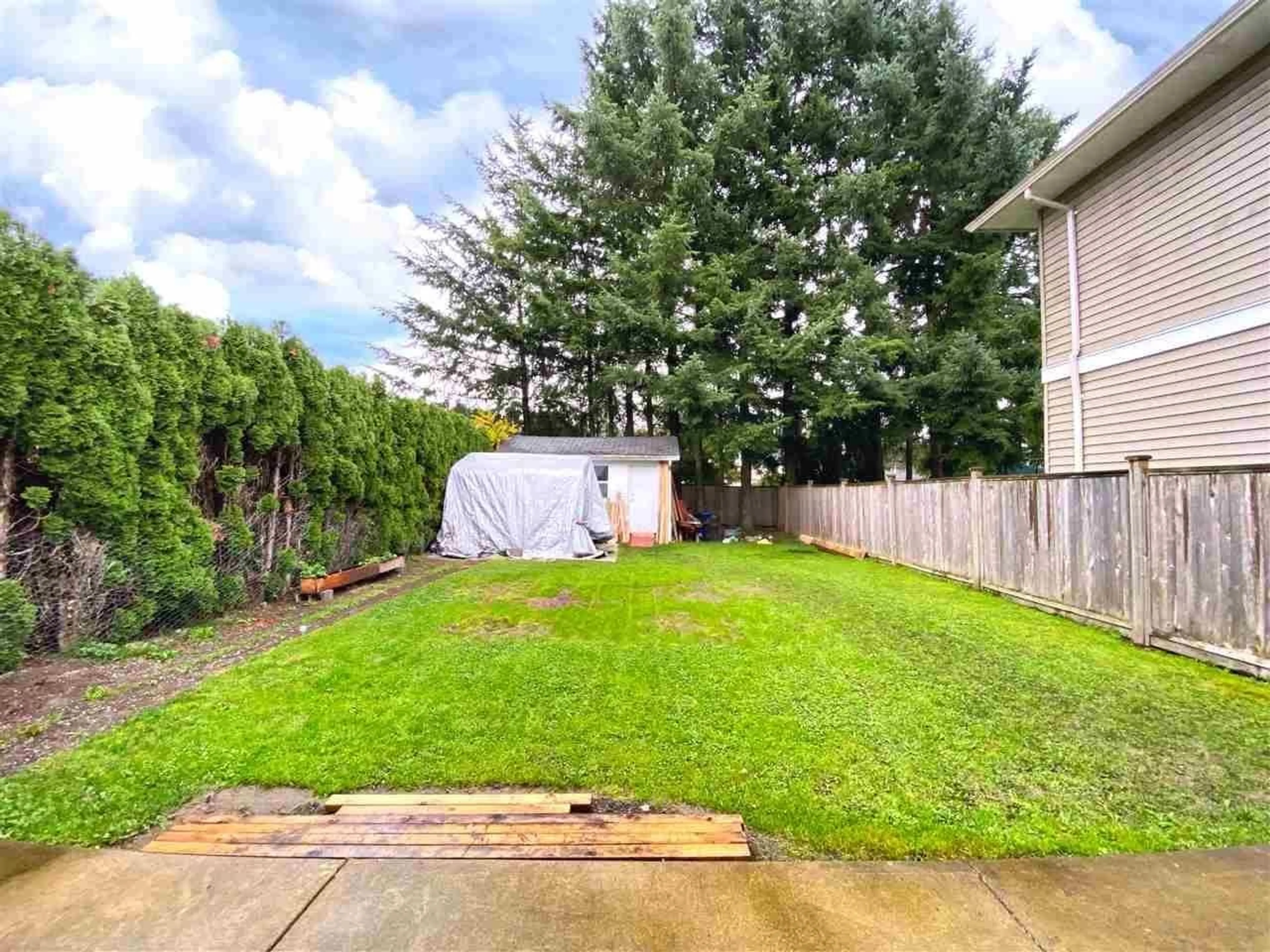 A pic from outside/outdoor area/front of a property/back of a property/a pic from drone, street for 9446 MENZIES STREET, Chilliwack British Columbia V2P5Z4