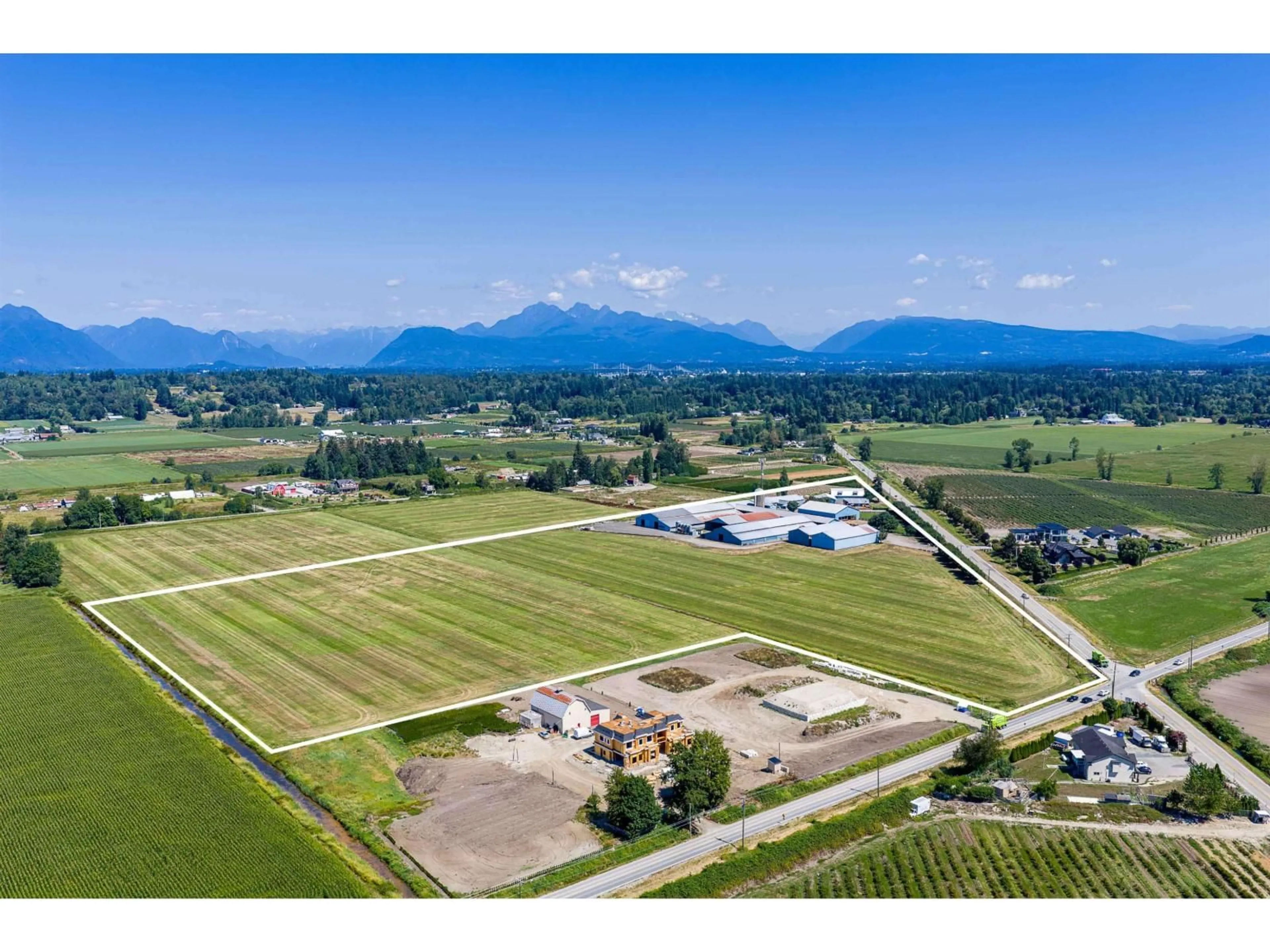 A pic from outside/outdoor area/front of a property/back of a property/a pic from drone, mountain view for 8129 HARVIE ROAD, Surrey British Columbia V4N6A8