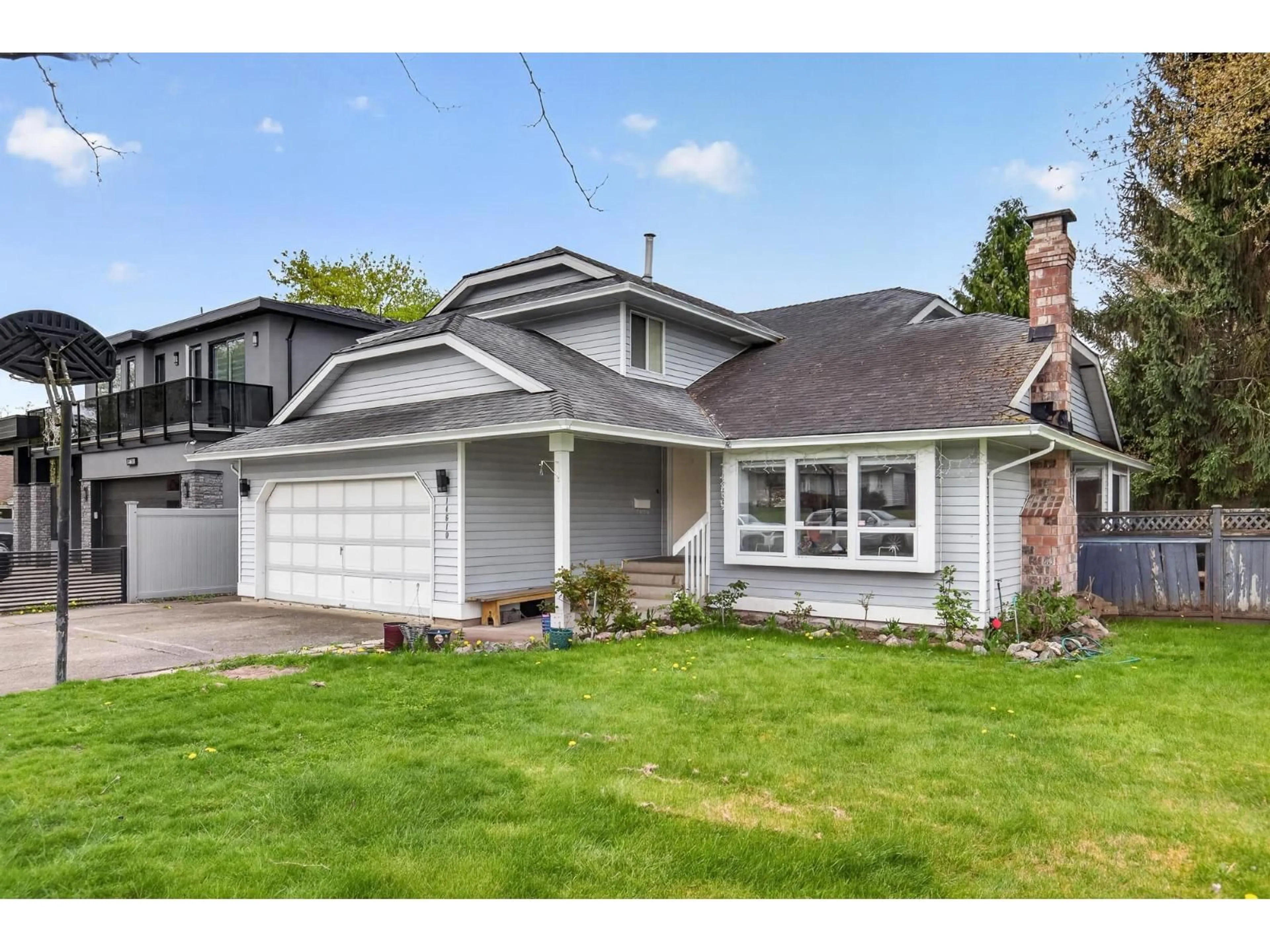 Home with vinyl exterior material, street for 14610 87 AVENUE, Surrey British Columbia V3S6R2