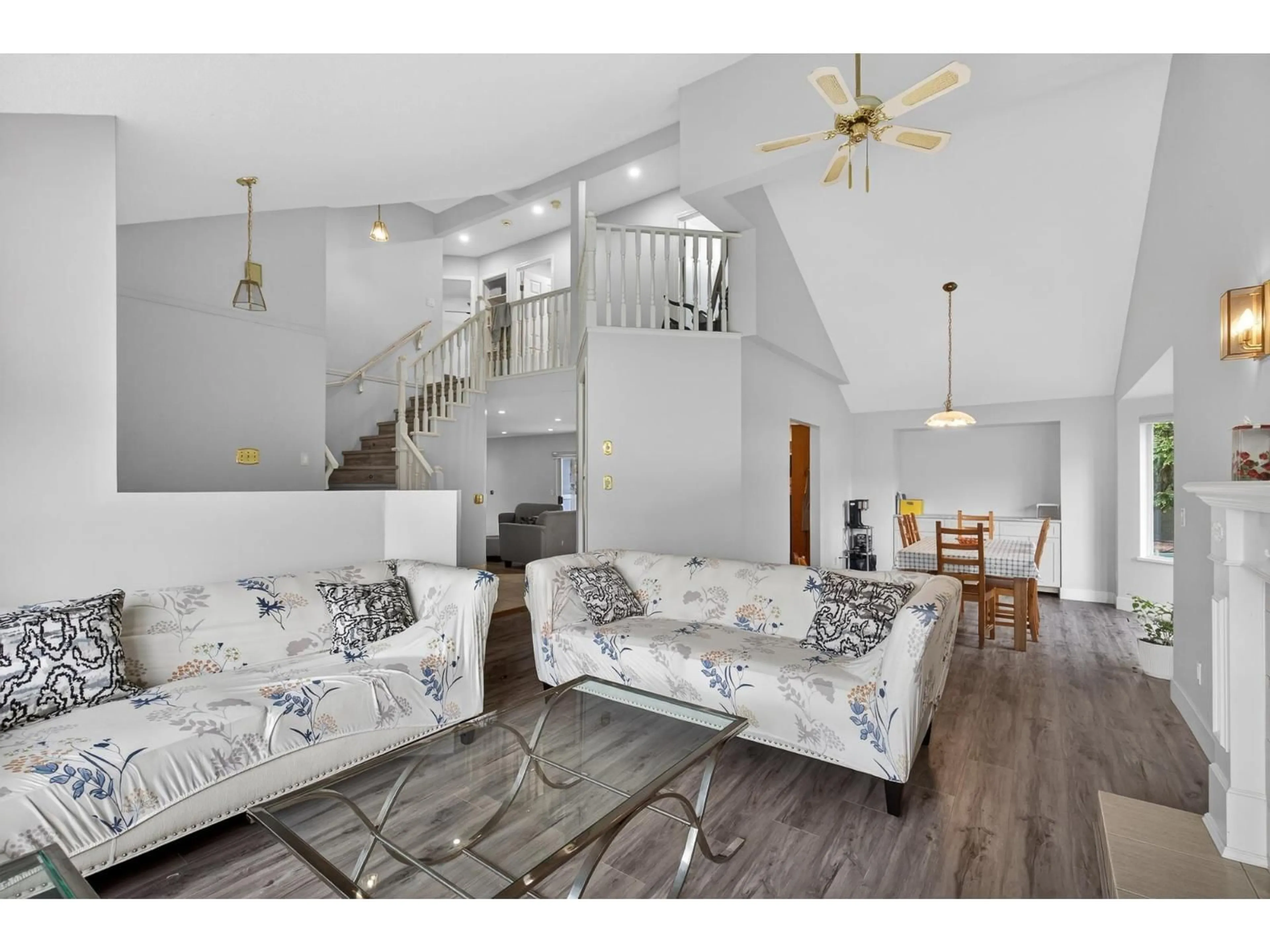 Living room with furniture, wood/laminate floor for 14610 87 AVENUE, Surrey British Columbia V3S6R2