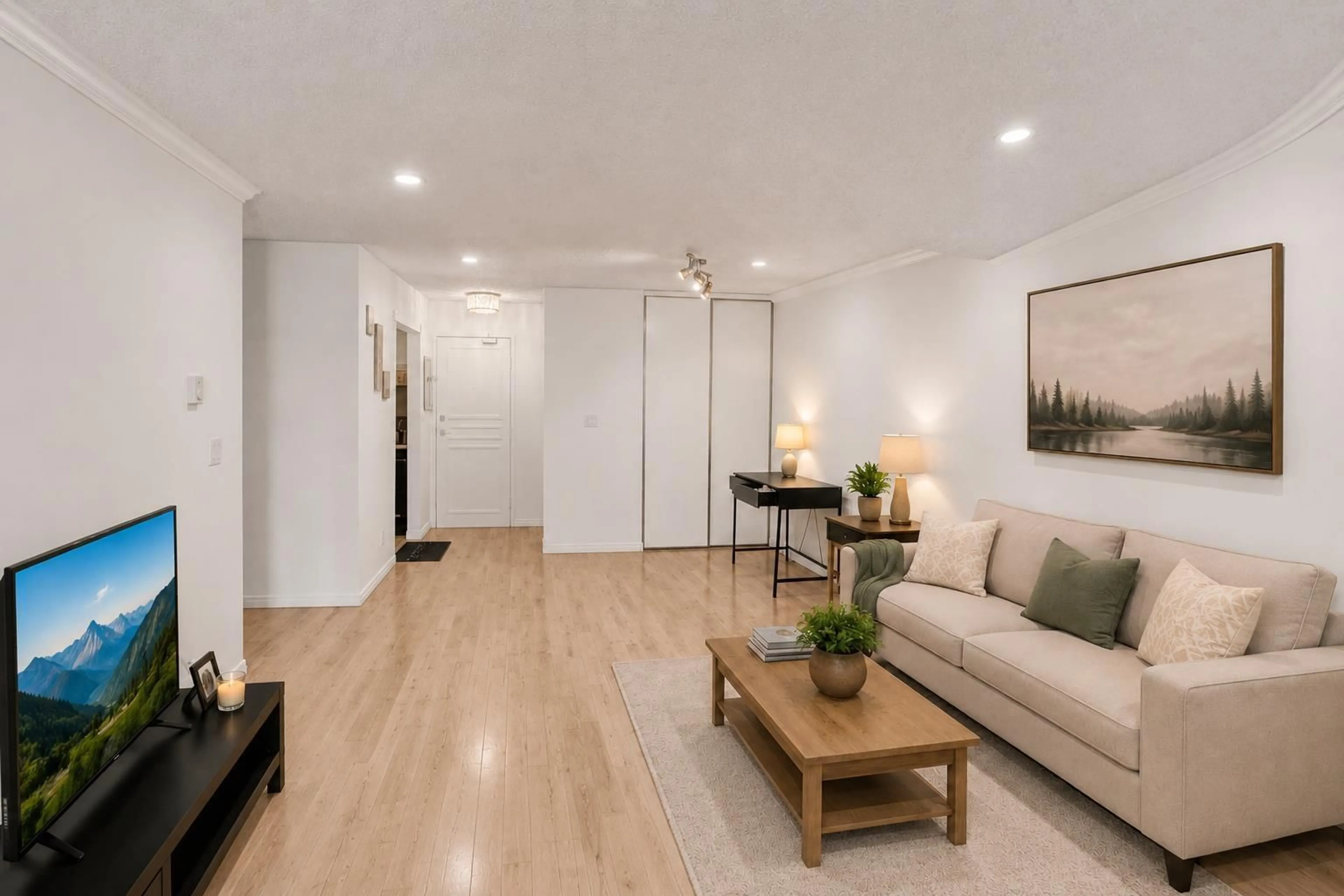 Living room with furniture, wood/laminate floor for 201 - 10560 154 STREET, Surrey British Columbia V3R8A3