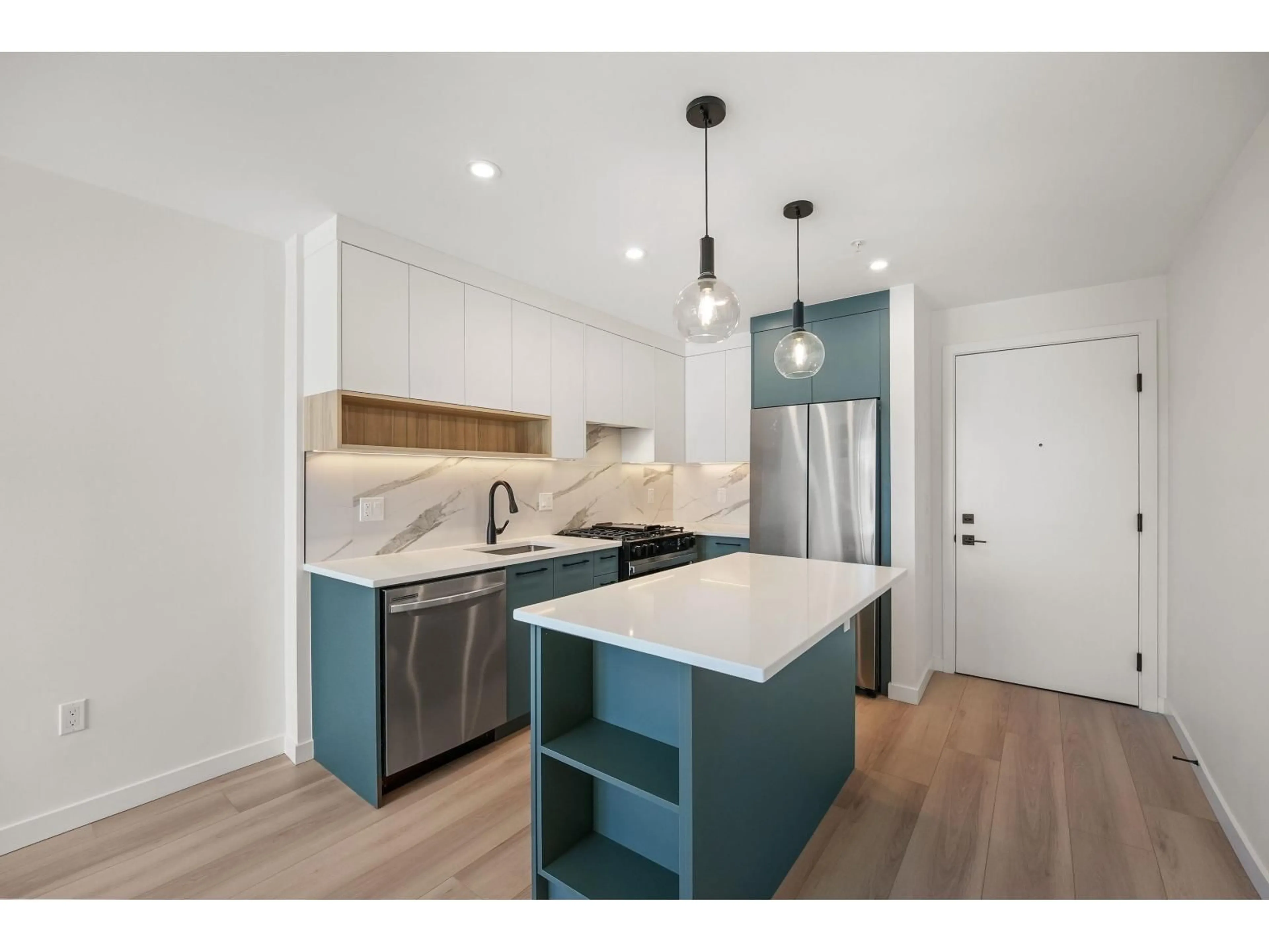 Open concept kitchen, unknown for 409 - 6270 GOOSEBERRY DRIVE, Surrey British Columbia V3S0B7