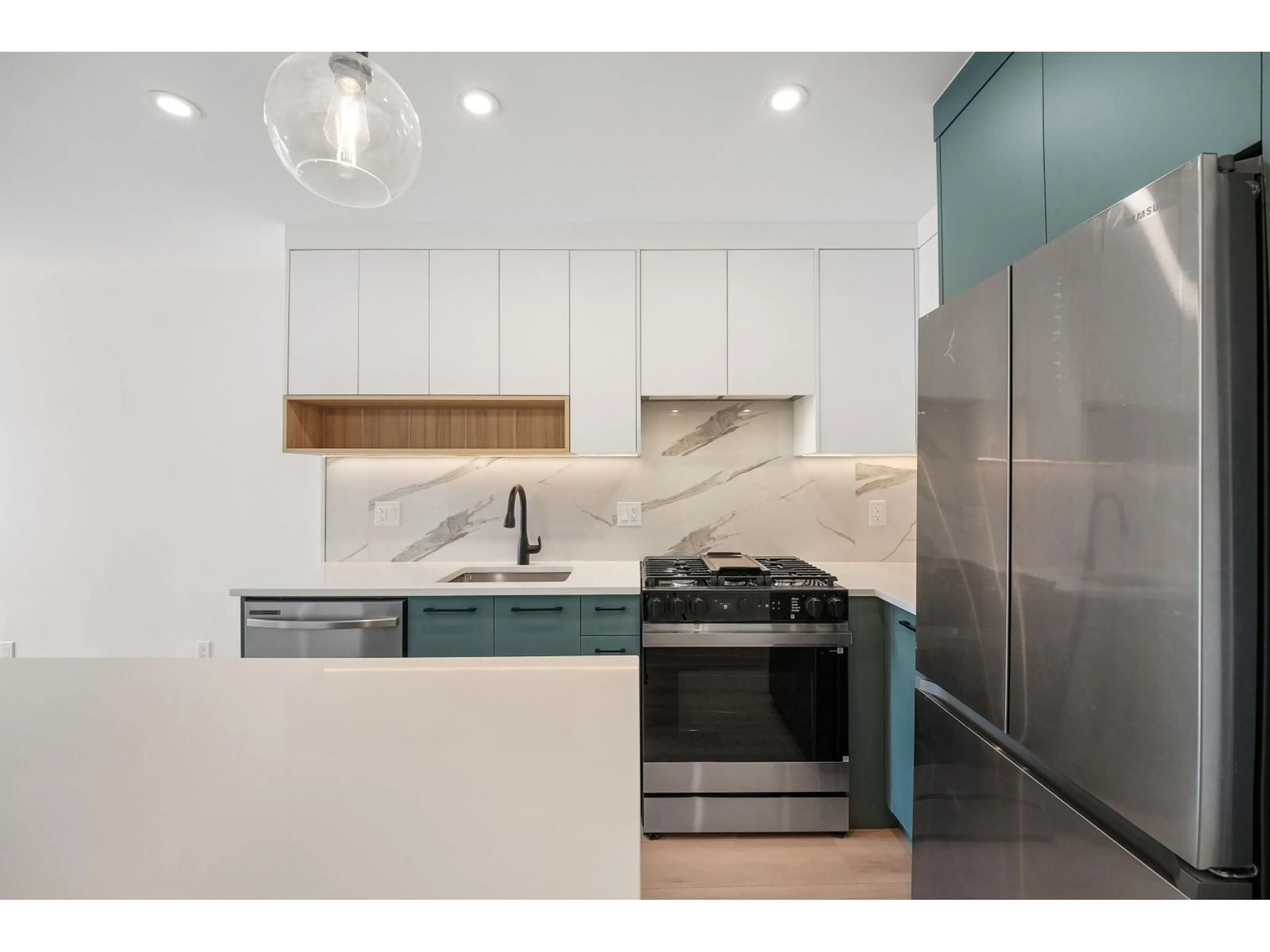 Contemporary kitchen, ceramic/tile floor for 409 - 6270 GOOSEBERRY DRIVE, Surrey British Columbia V3S0B7