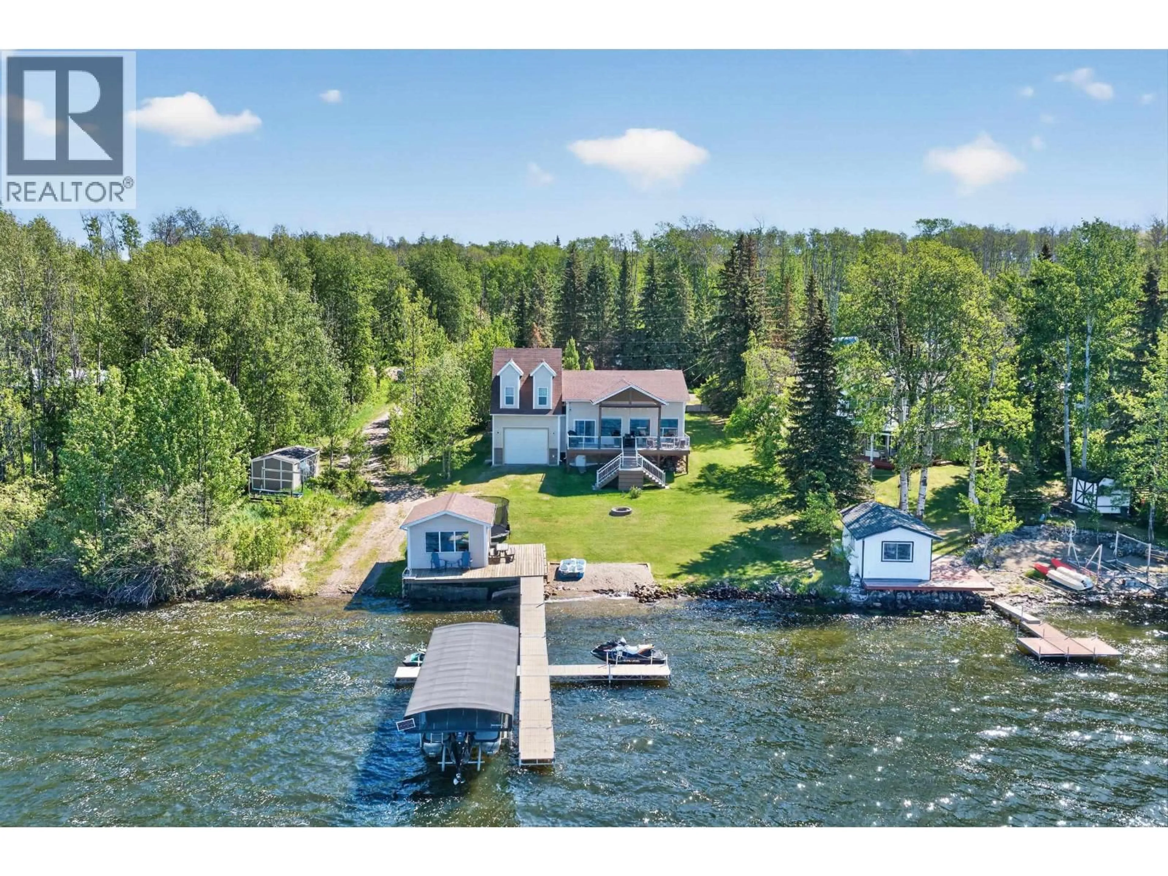 A pic from outside/outdoor area/front of a property/back of a property/a pic from drone, water/lake/river/ocean view for 13239 PARADISE STREET, Fort St. John British Columbia V0C1H0