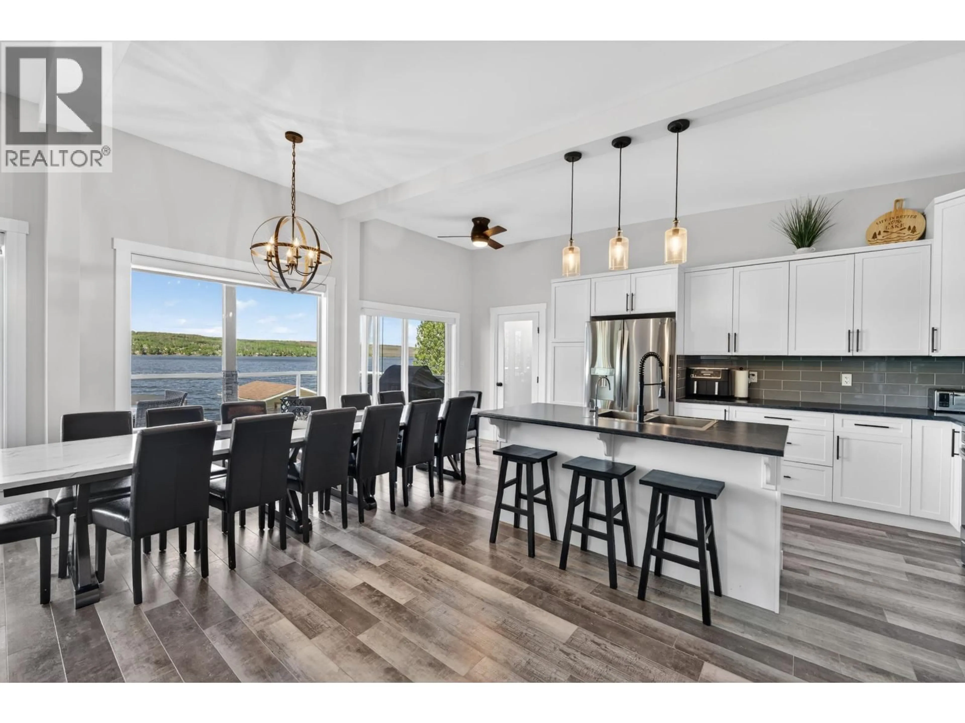 Open concept kitchen, wood/laminate floor for 13239 PARADISE STREET, Fort St. John British Columbia V0C1H0