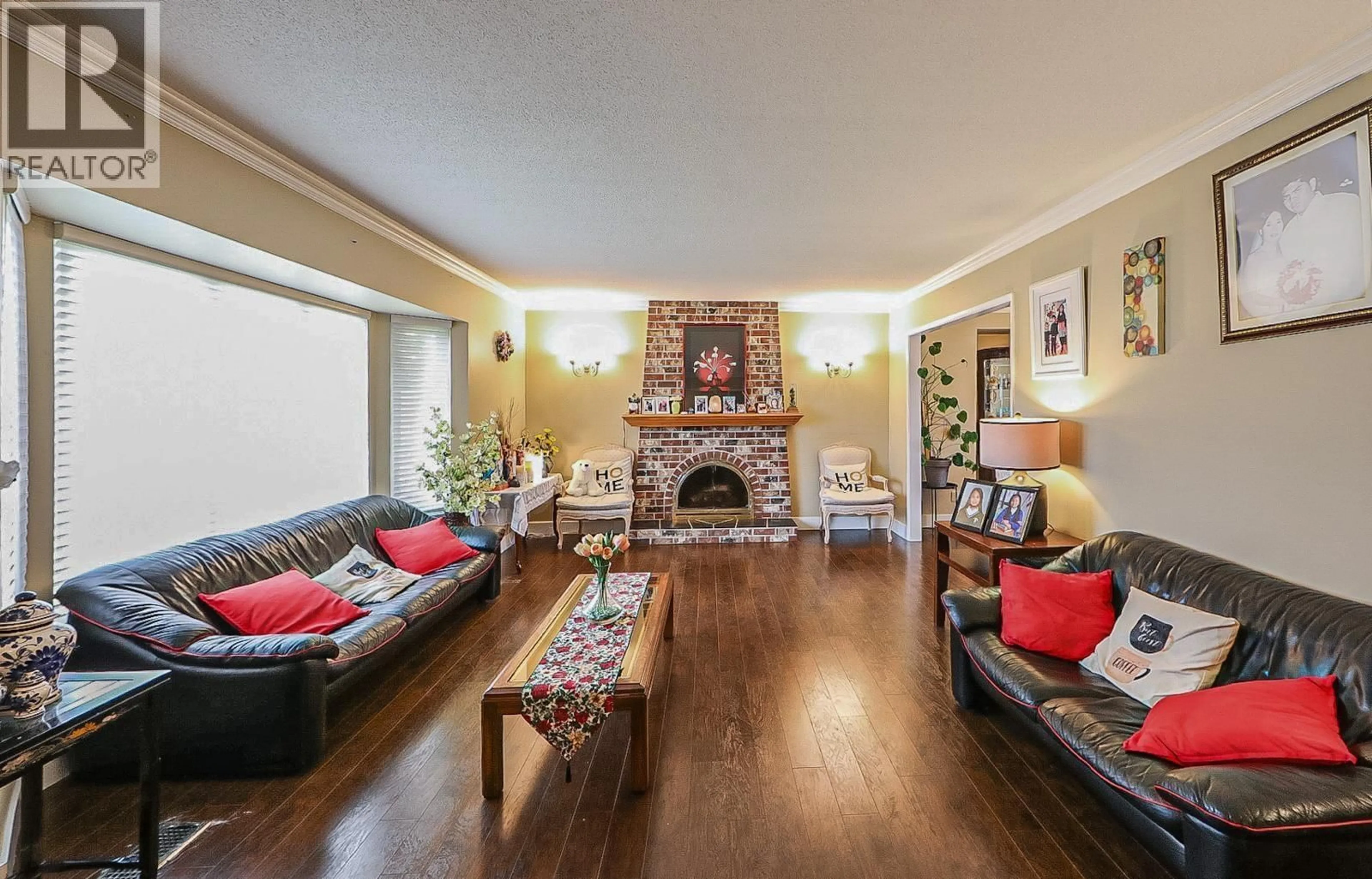 Living room with furniture, wood/laminate floor for 10340 BAMBERTON DRIVE, Richmond British Columbia V7A1K3