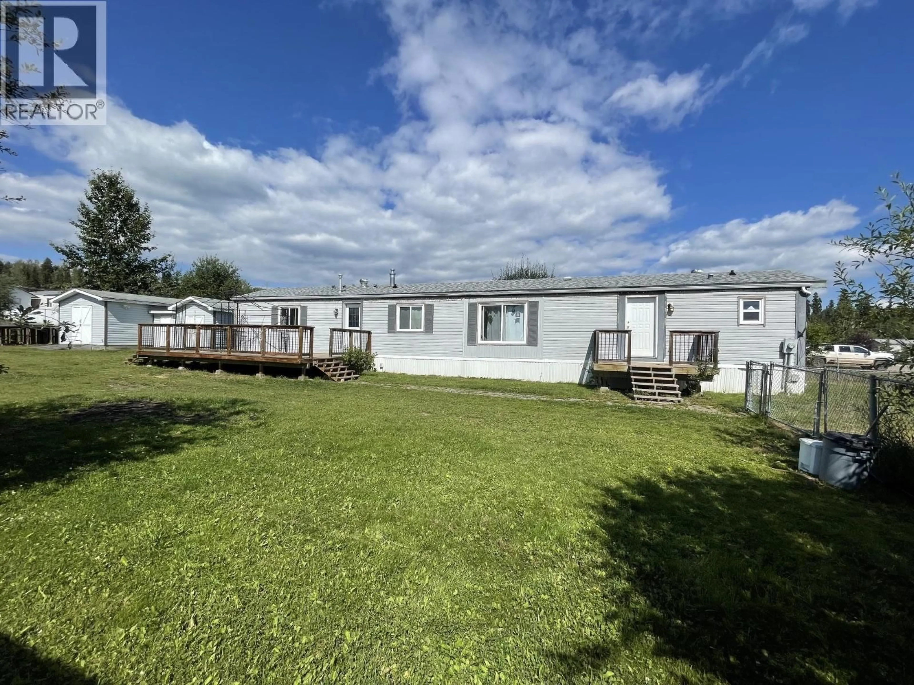 A pic from outside/outdoor area/front of a property/back of a property/a pic from drone, unknown for 5509 42 STREET, Fort Nelson British Columbia V0C1R0