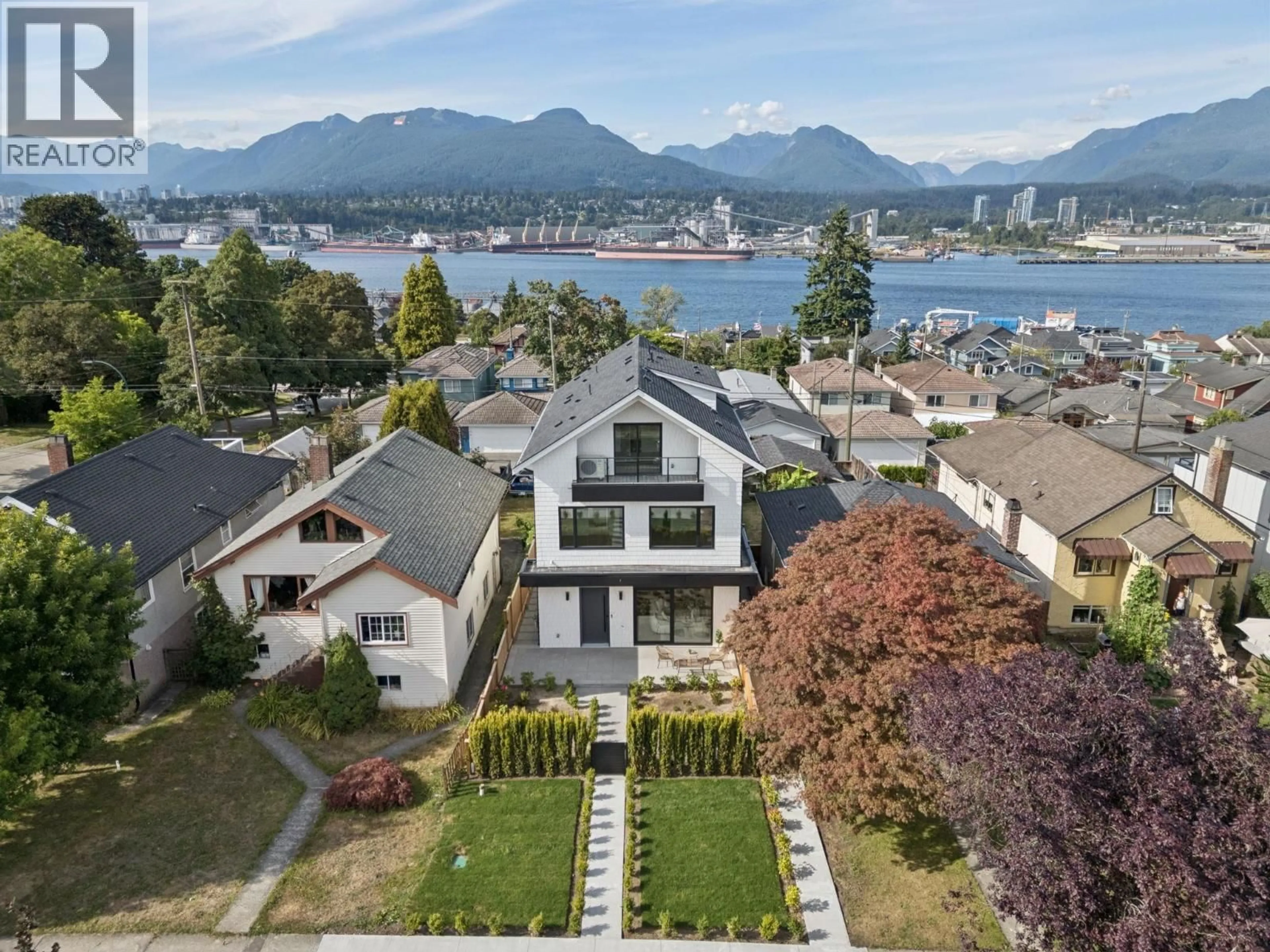 A pic from outside/outdoor area/front of a property/back of a property/a pic from drone, water/lake/river/ocean view for 1 - 2815 TRINITY STREET, Vancouver British Columbia V5K1E8