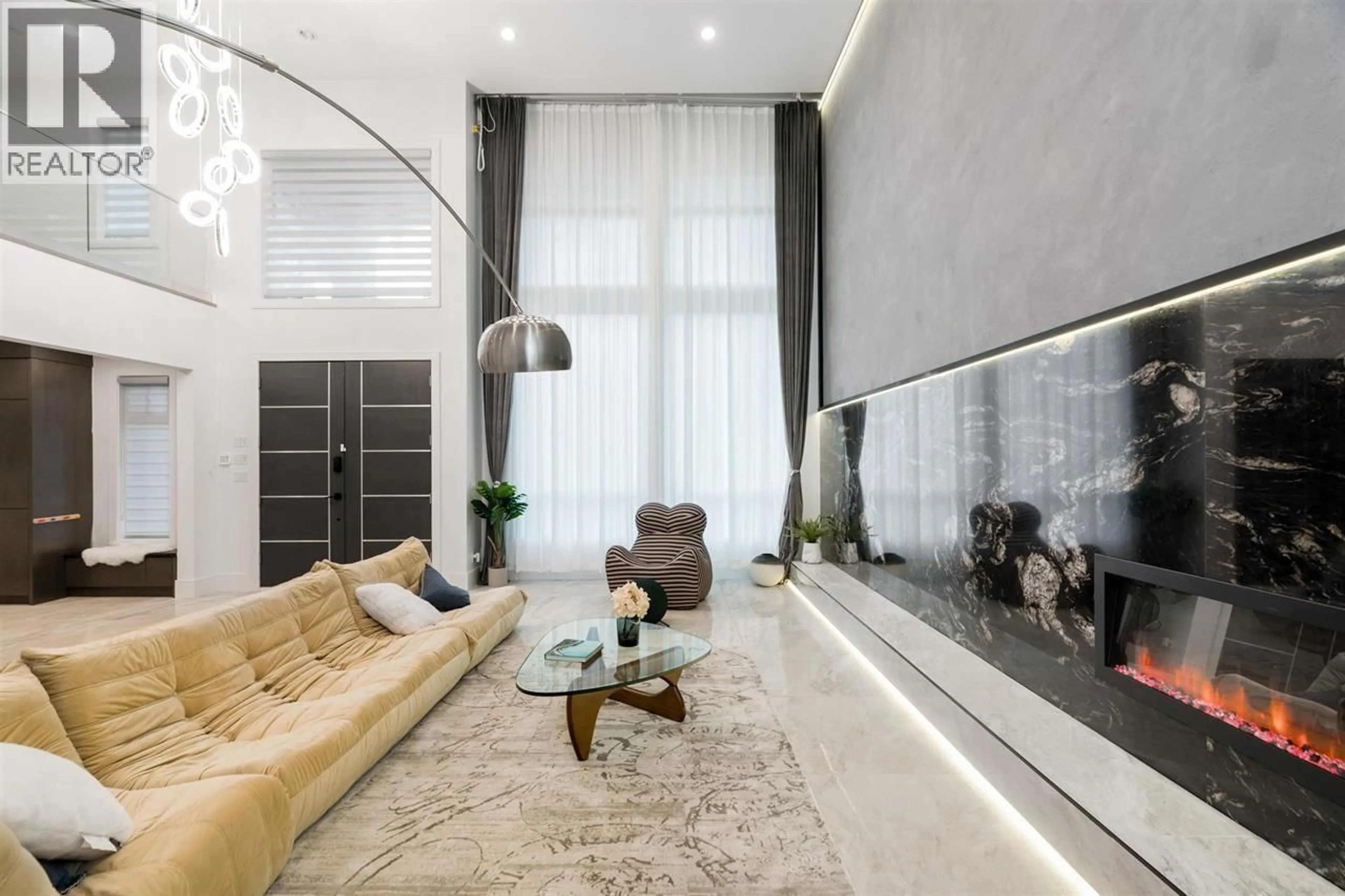 Living room with furniture, cement floor for 7490 NO. 4 ROAD, Richmond British Columbia V6Y2T5