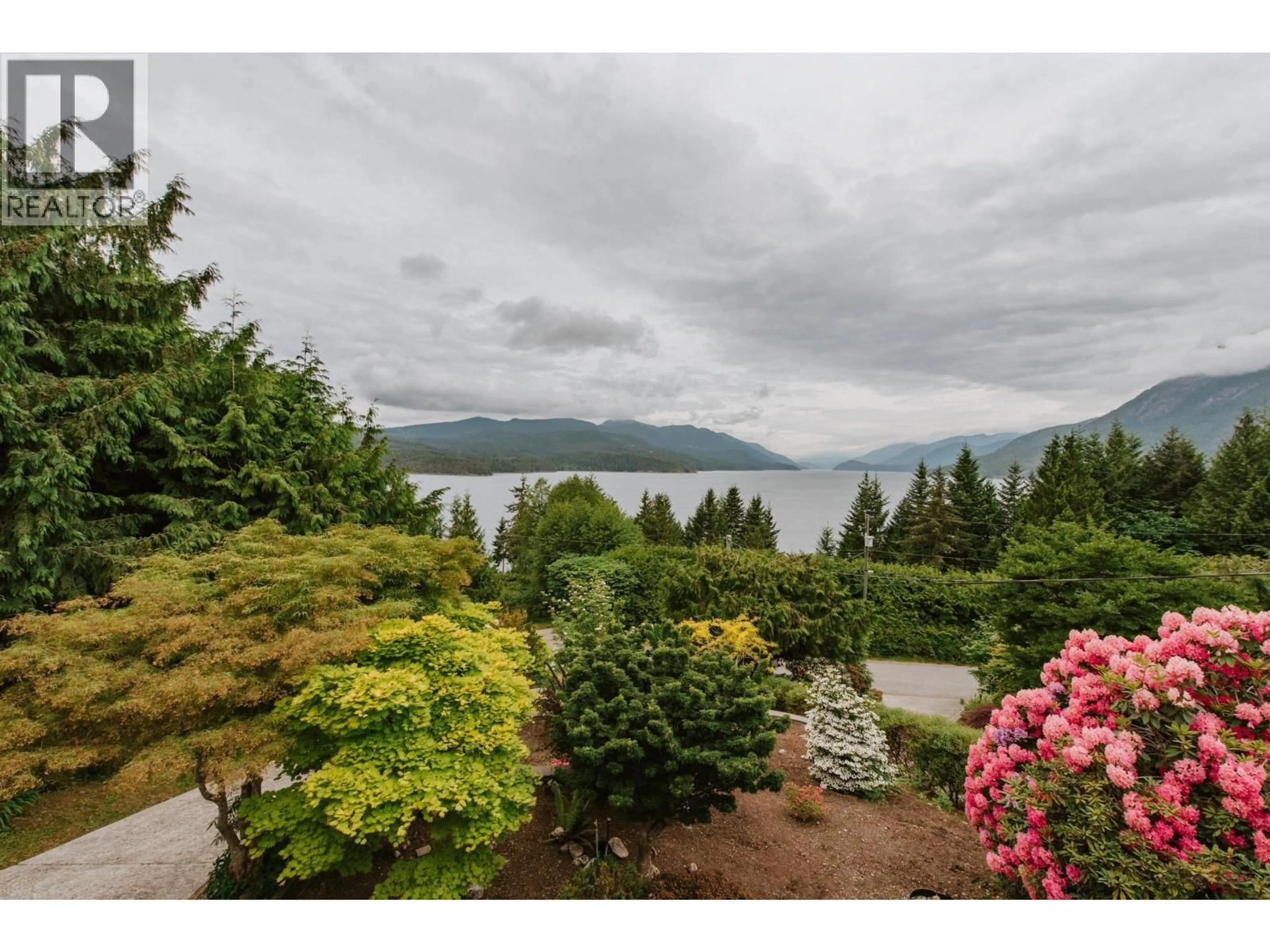 A pic from outside/outdoor area/front of a property/back of a property/a pic from drone, water/lake/river/ocean view for 6950 PORPOISE DRIVE, Sechelt British Columbia V7Z0C8