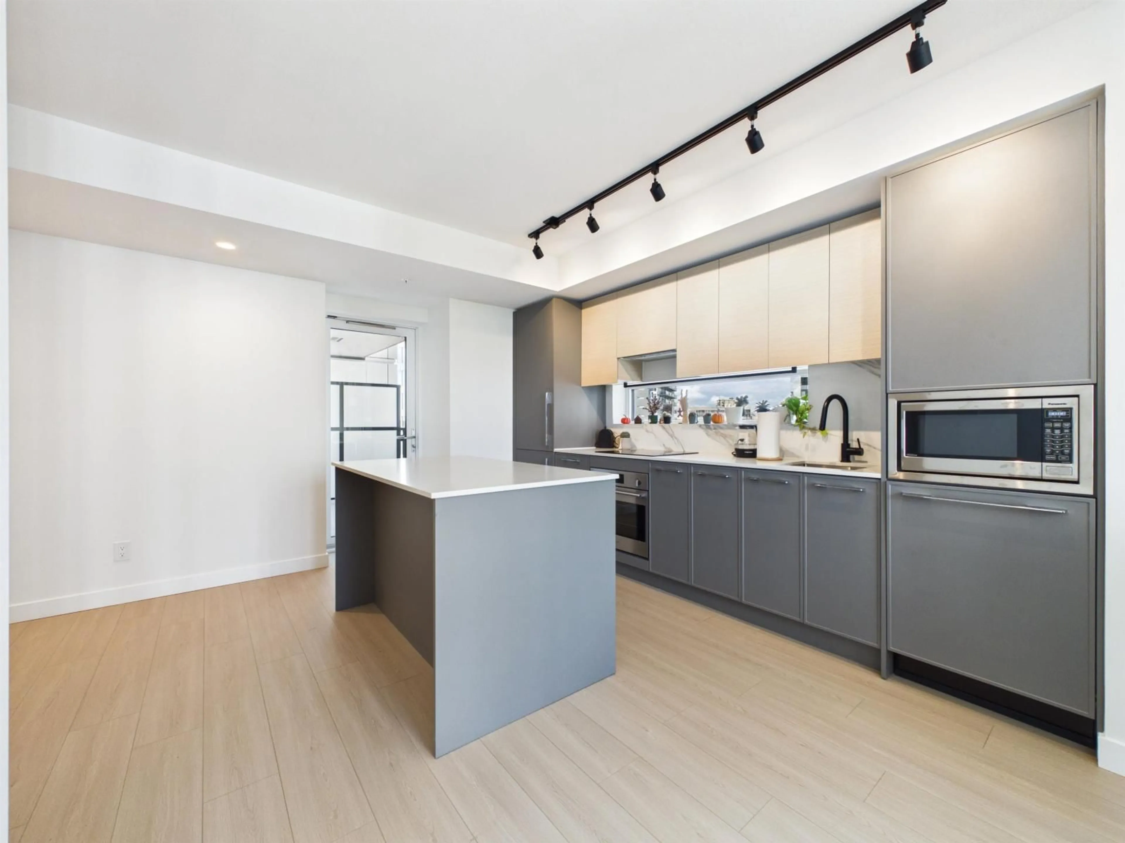 Open concept kitchen, unknown for 1004 - 13745 GEORGE JUNCTION, Surrey British Columbia V3T0V8