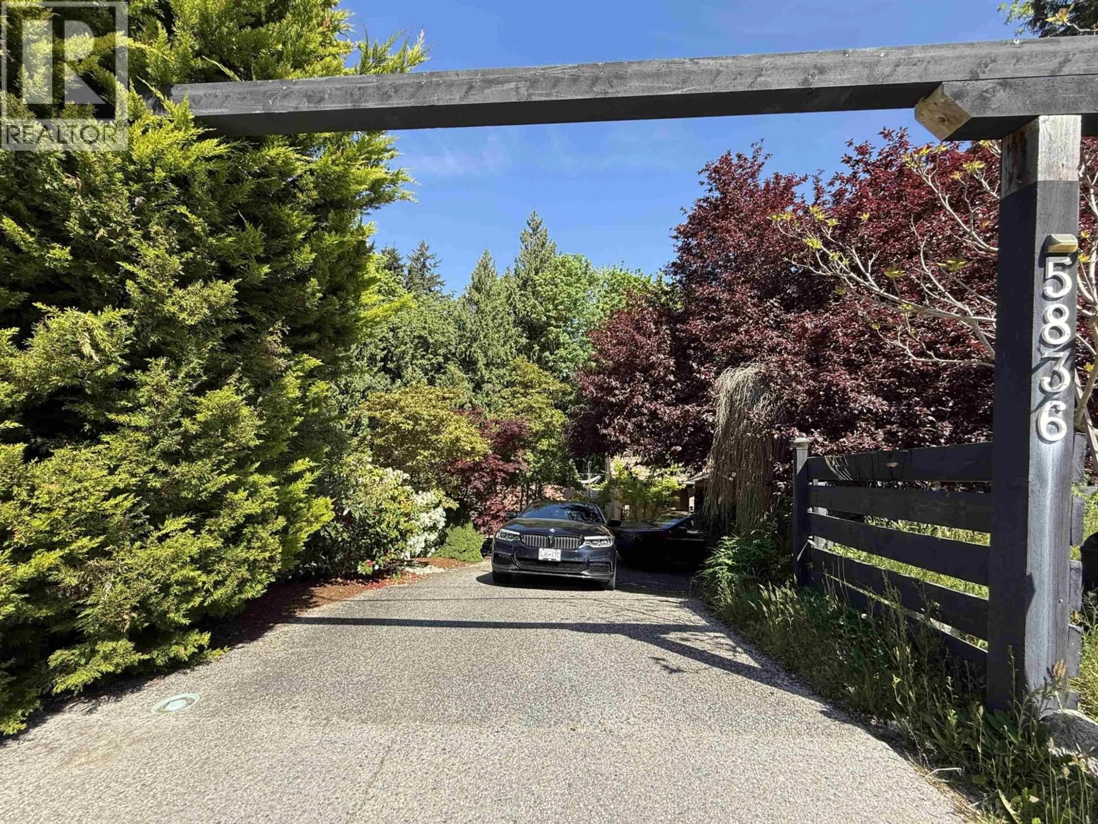 A pic from outside/outdoor area/front of a property/back of a property/a pic from drone, street for 5836 MARINE WAY, Sechelt British Columbia V7Z0R3