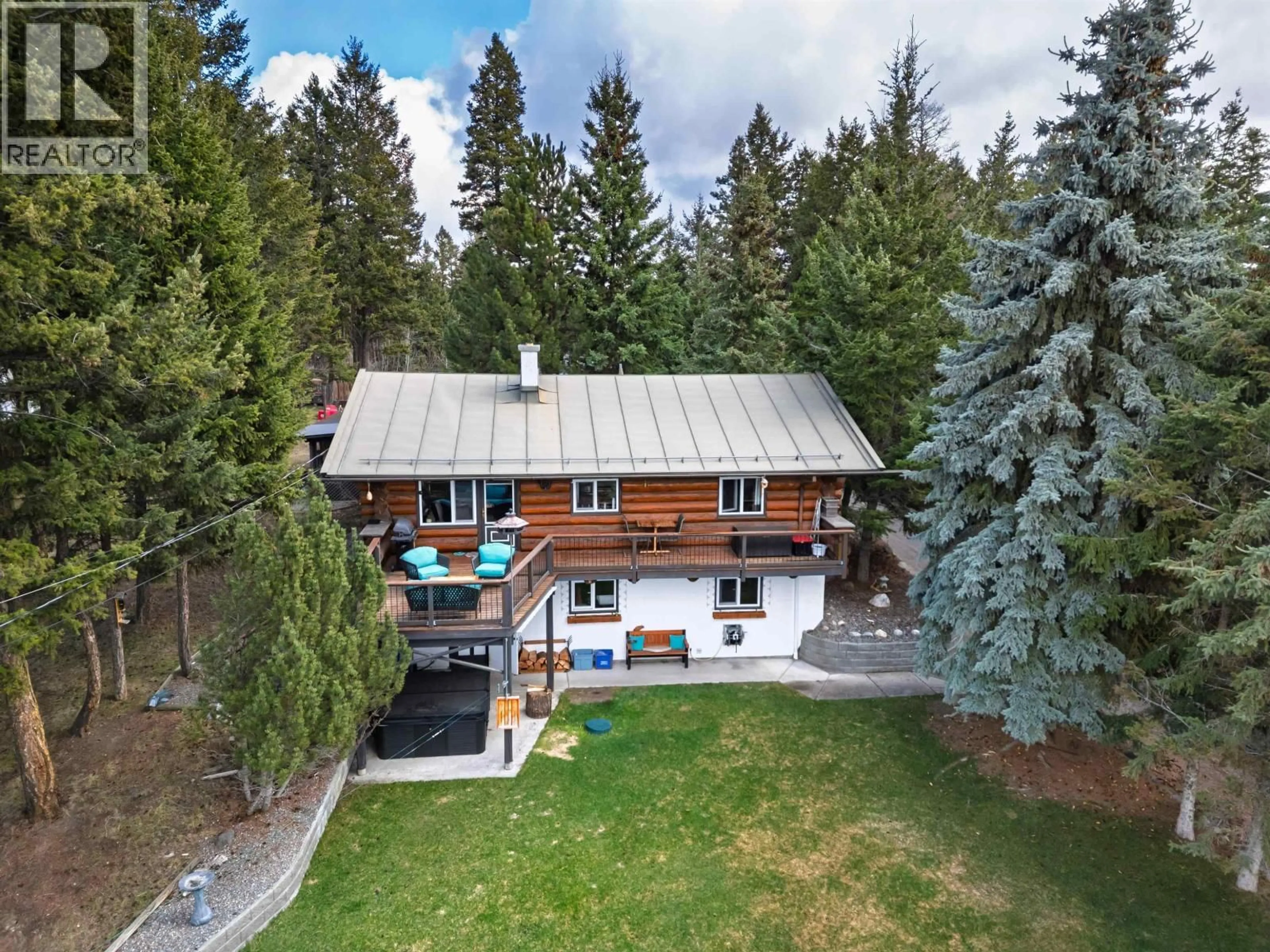 A pic from outside/outdoor area/front of a property/back of a property/a pic from drone, unknown for 5031 GLOINNZUN DRIVE, 108 Mile Ranch British Columbia V0K2Z0