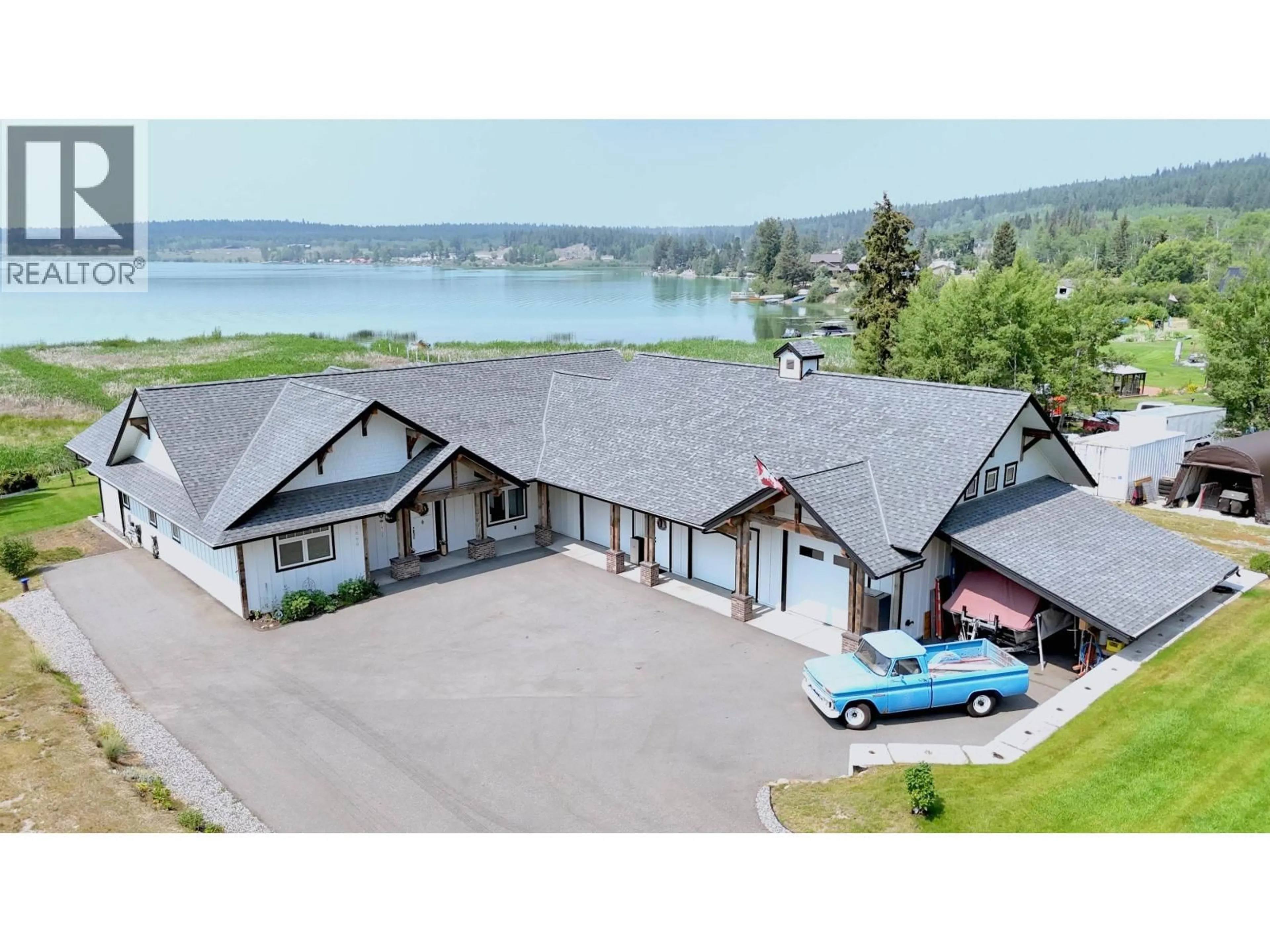 A pic from outside/outdoor area/front of a property/back of a property/a pic from drone, water/lake/river/ocean view for 3660 FORBES ROAD, Lac La Hache British Columbia V0K1T1