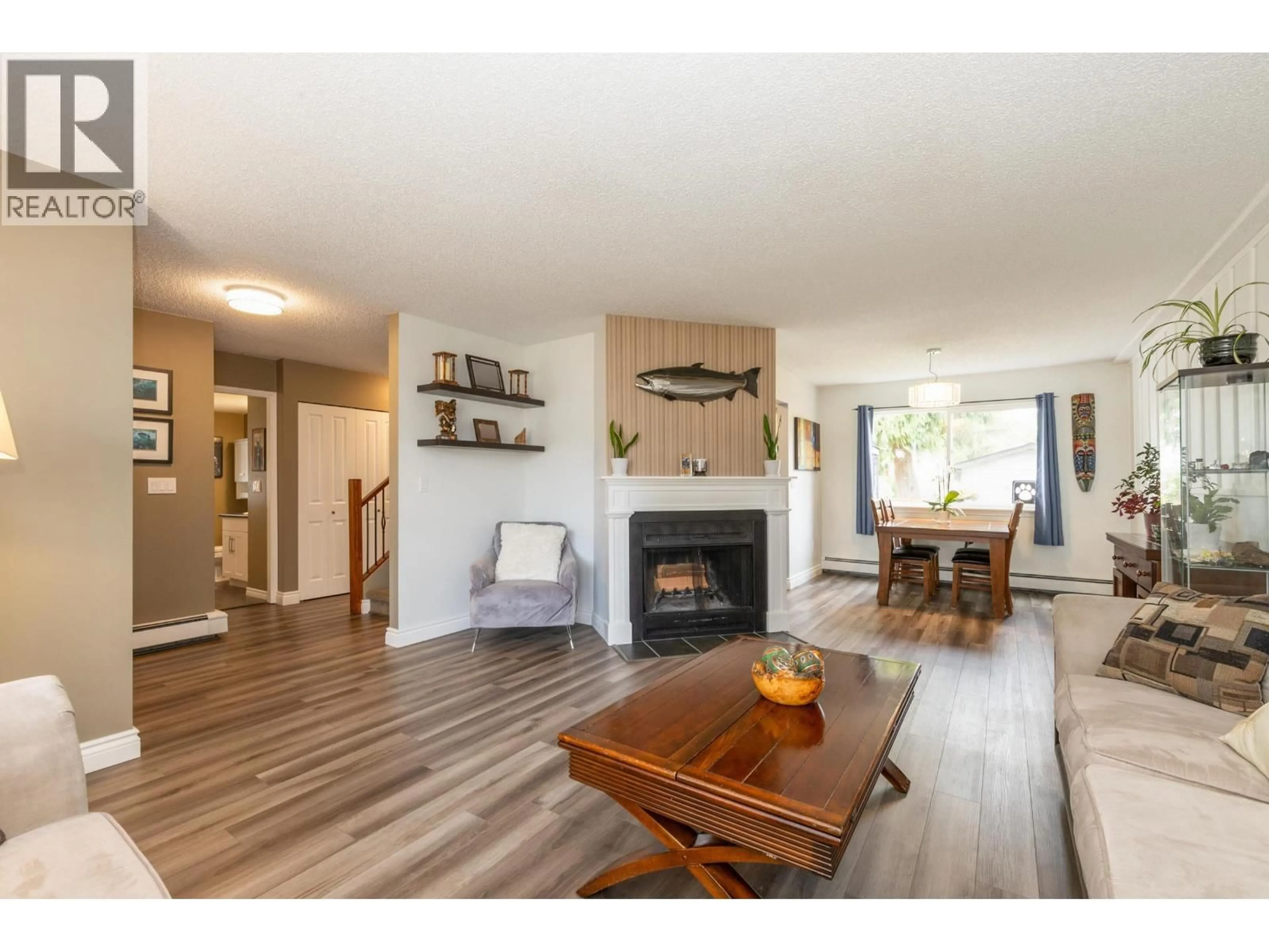 Living room with furniture, wood/laminate floor for 11761 190 STREET, Pitt Meadows British Columbia V3Y1Y2