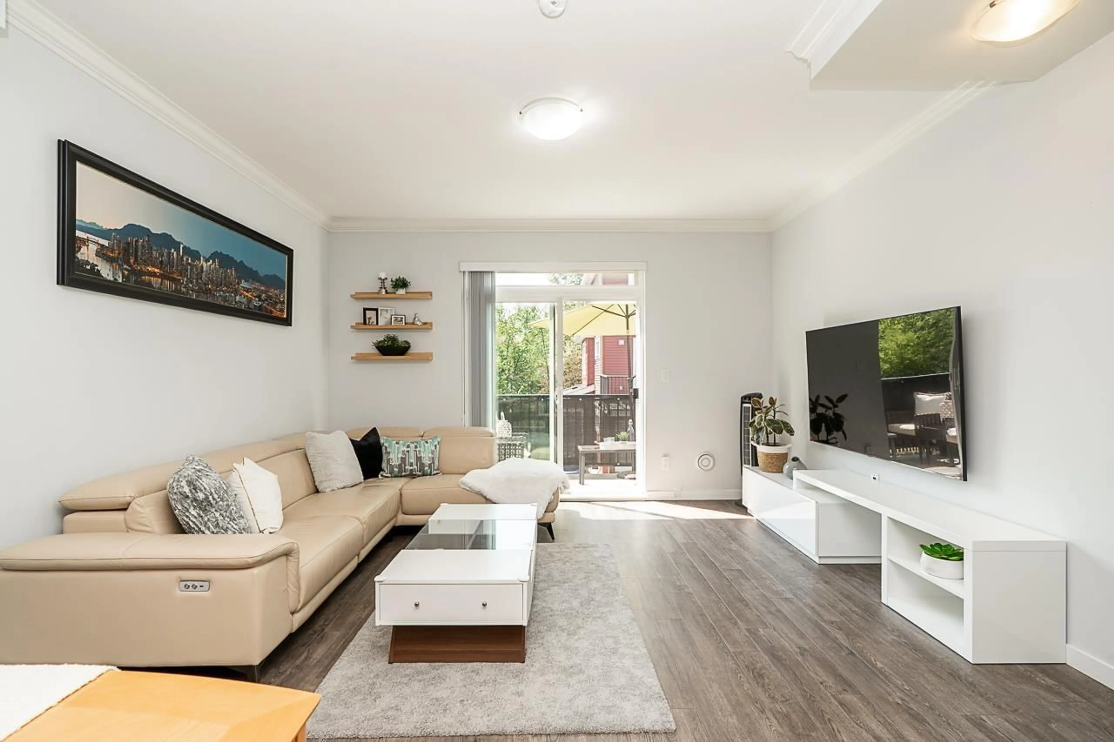 Living room with furniture, wood/laminate floor for 54 - 19128 65 AVENUE, Surrey British Columbia V4N6P2