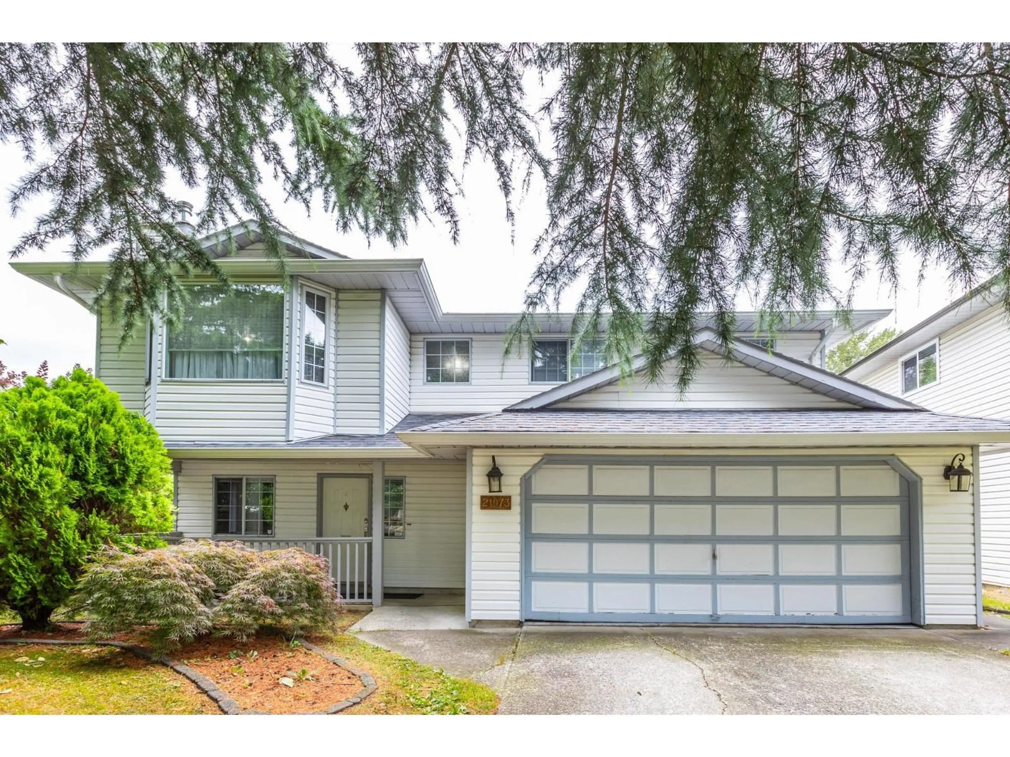 Home with vinyl exterior material, street for 21073 93 AVENUE, Langley British Columbia V1M2B3