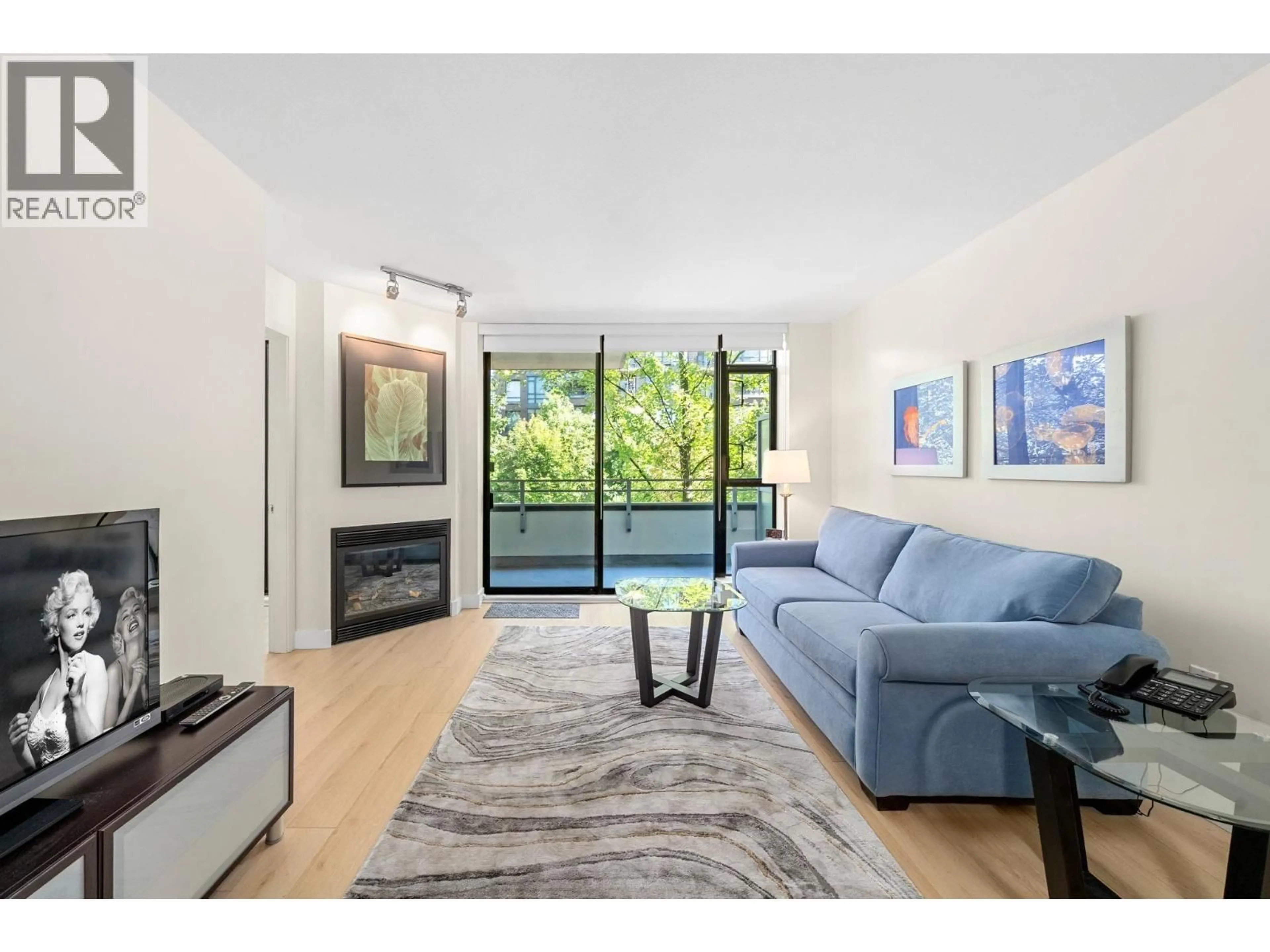 Living room with furniture, unknown for 305 - 175 1ST STREET, North Vancouver British Columbia V7M3N9