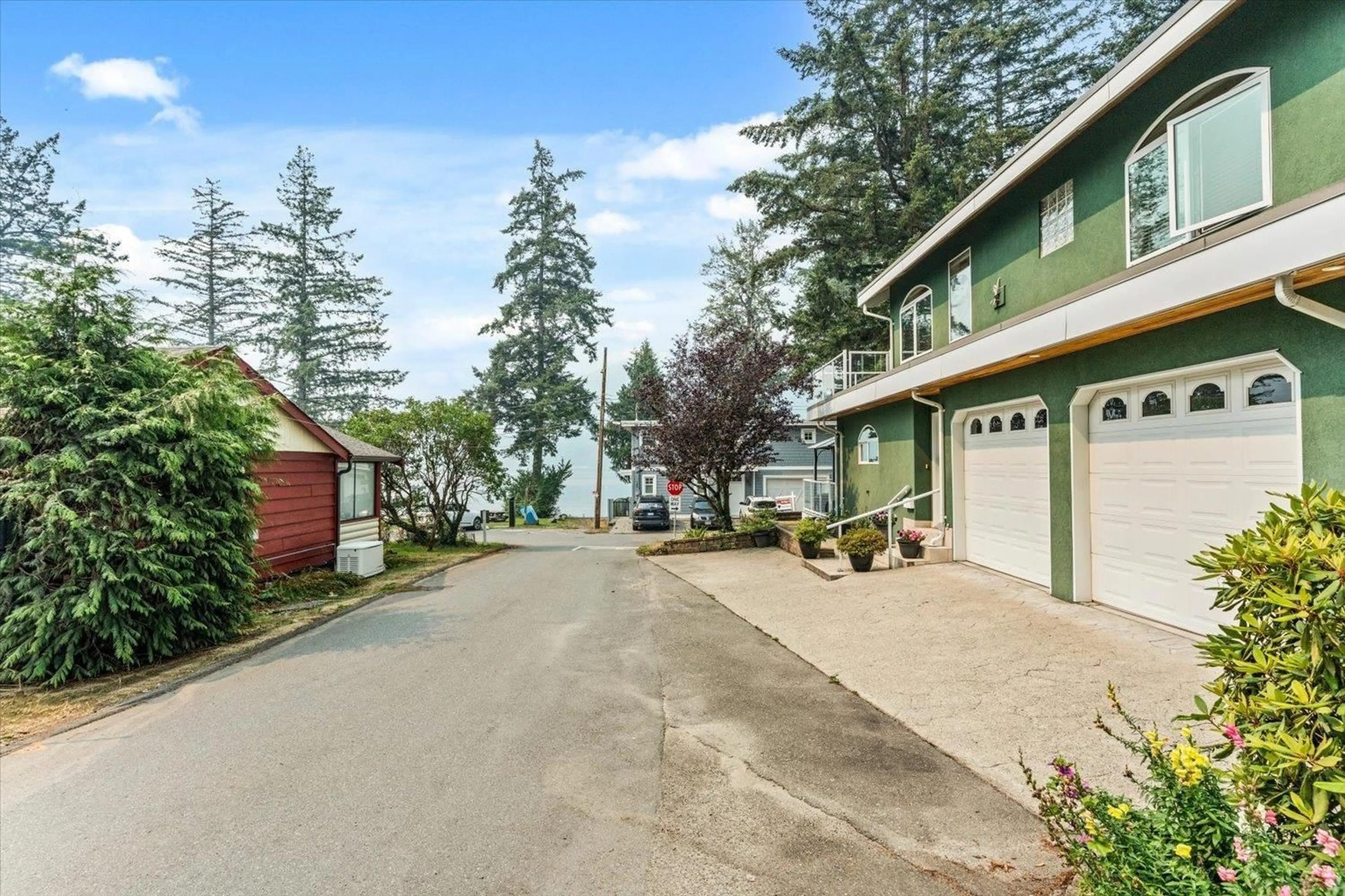 A pic from outside/outdoor area/front of a property/back of a property/a pic from drone, water/lake/river/ocean view for 267 FIRST AVENUE, Cultus Lake British Columbia V2R4Z4
