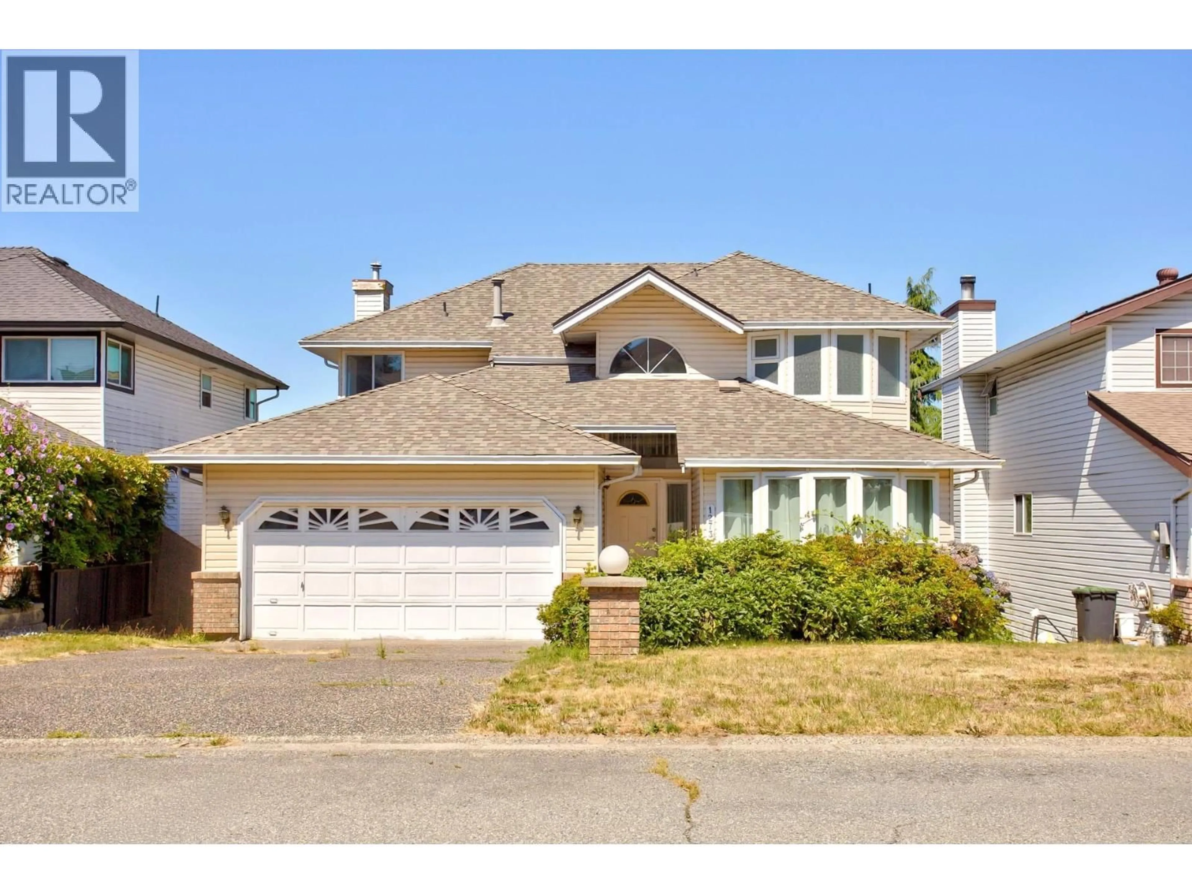Home with vinyl exterior material, street for 1273 BENNECK WAY, Port Coquitlam British Columbia V3C5Y8