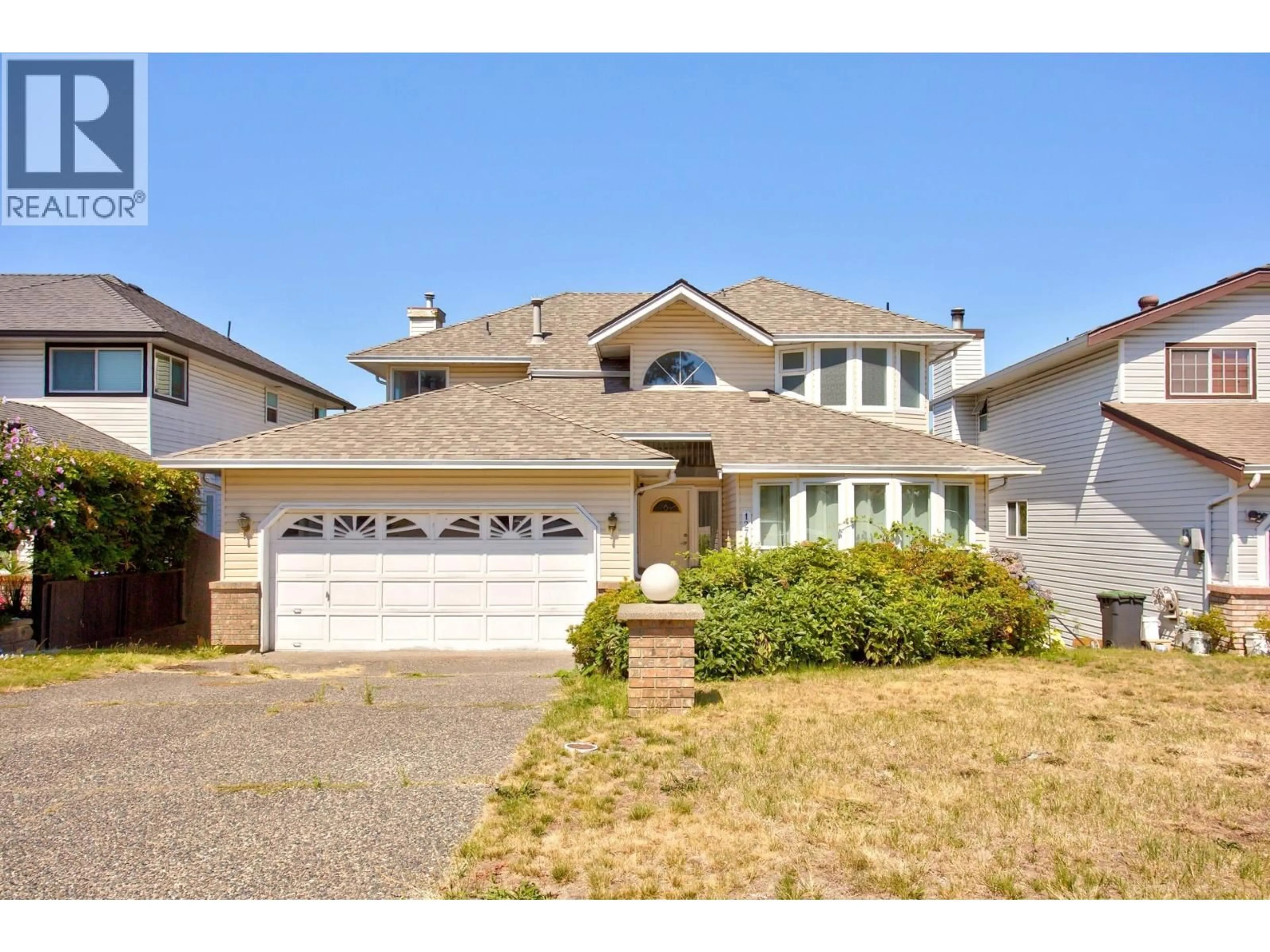 Home with vinyl exterior material, street for 1273 BENNECK WAY, Port Coquitlam British Columbia V3C5Y8