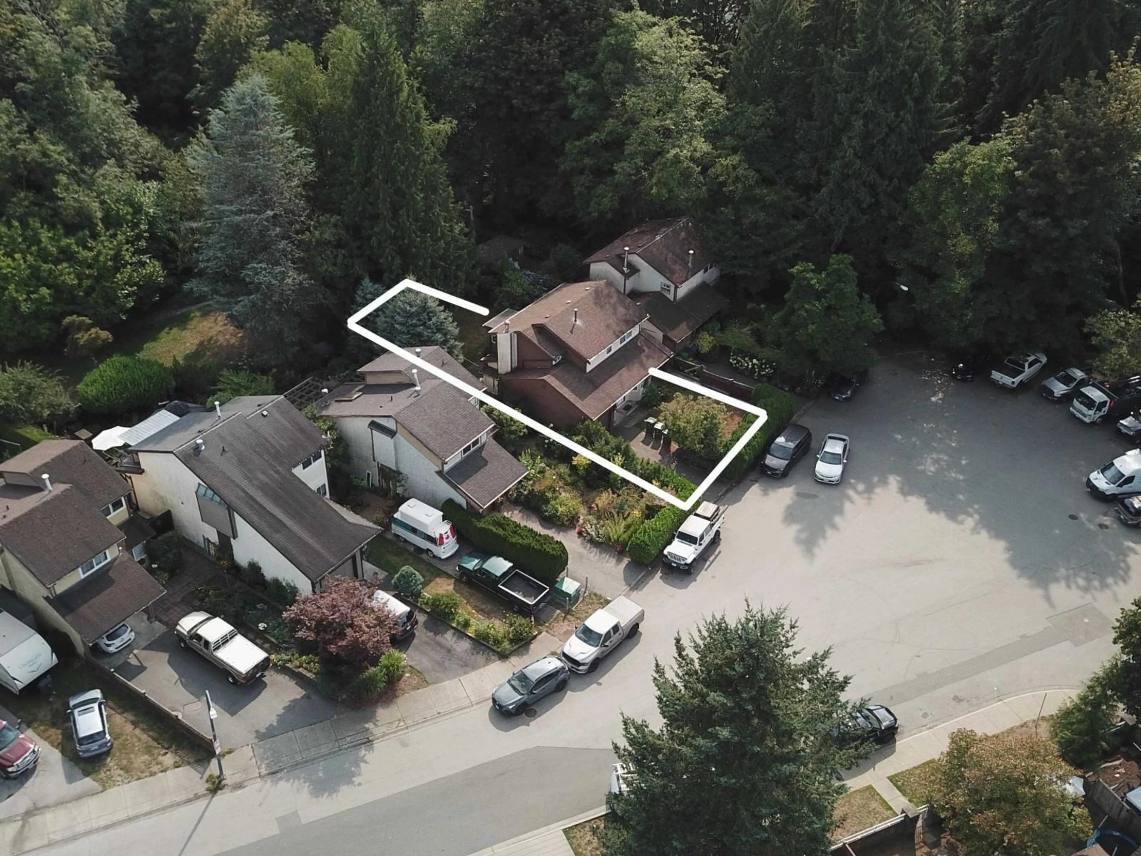 A pic from outside/outdoor area/front of a property/back of a property/a pic from drone, street for 13870 LAUREL DRIVE, Surrey British Columbia V3T1A9