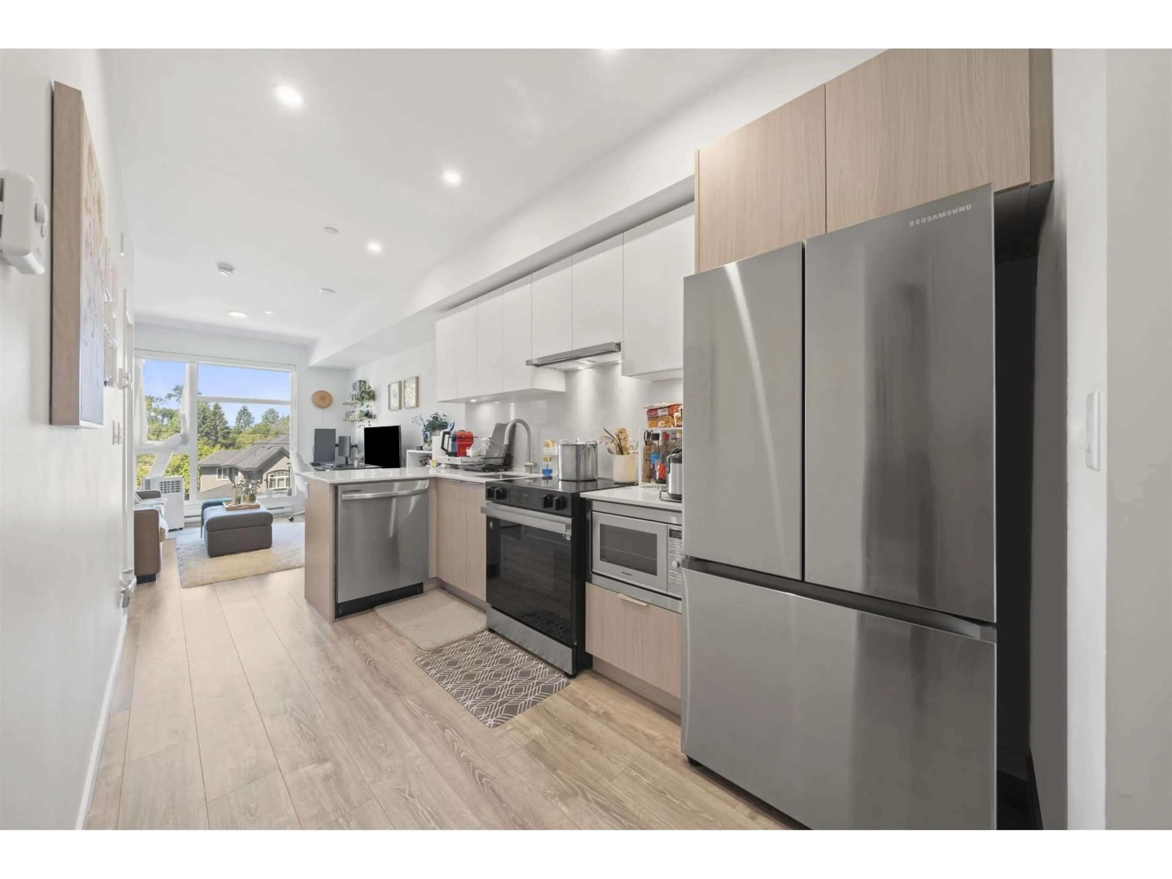 Open concept kitchen, unknown for 305 - 10828 139A STREET, Surrey British Columbia V3R0H3