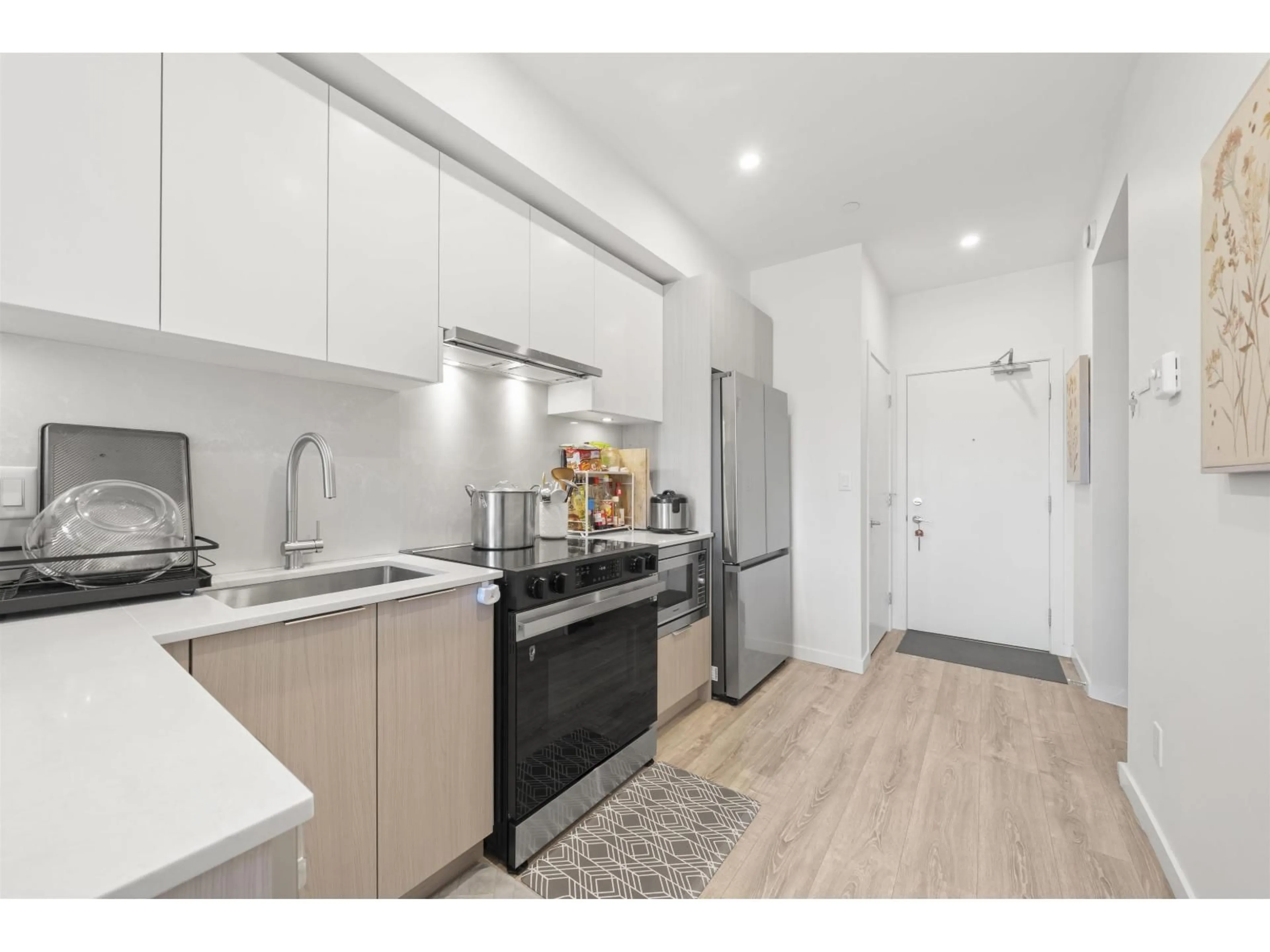 Open concept kitchen, unknown for 305 - 10828 139A STREET, Surrey British Columbia V3R0H3