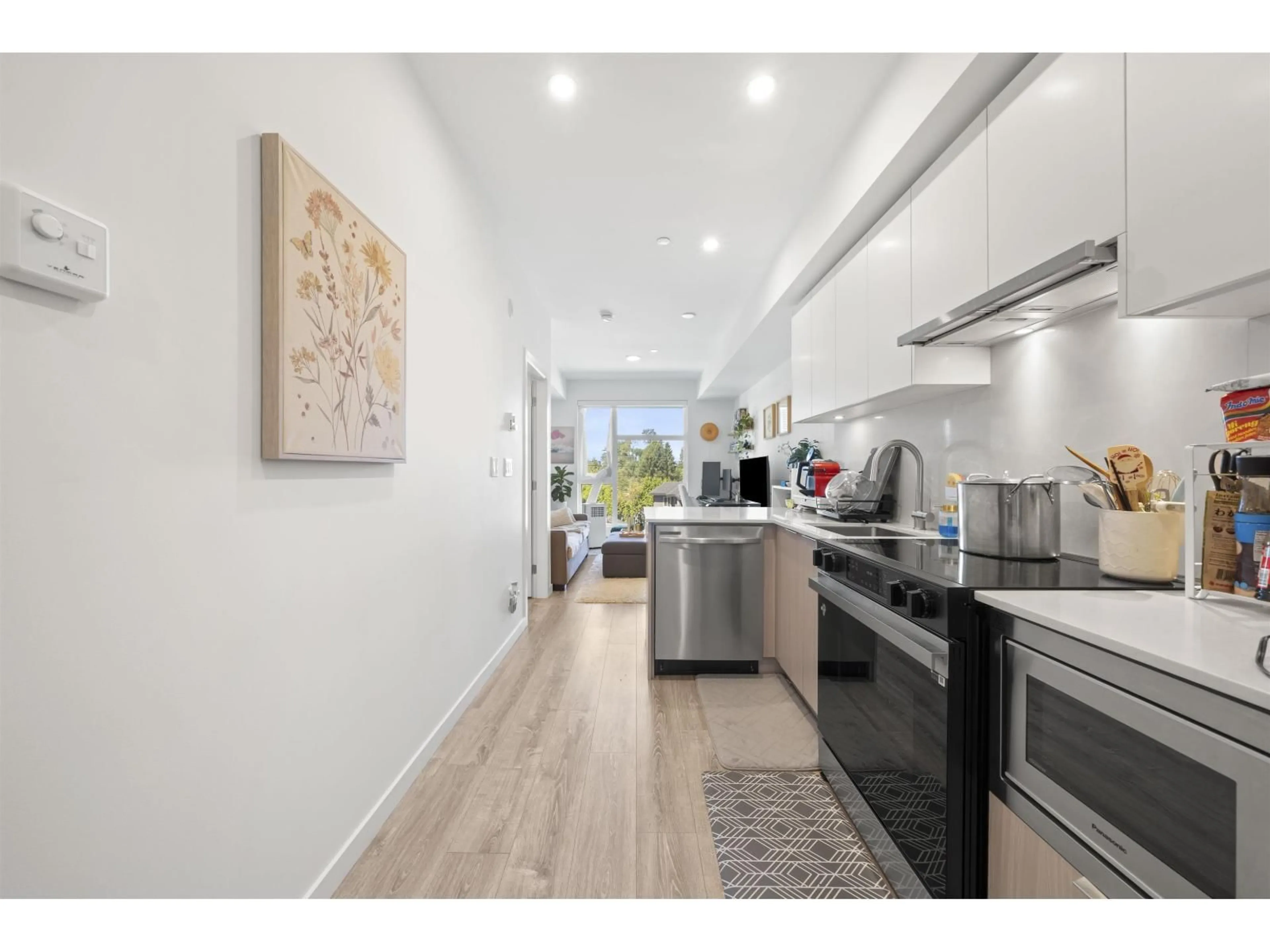 Open concept kitchen, unknown for 305 - 10828 139A STREET, Surrey British Columbia V3R0H3