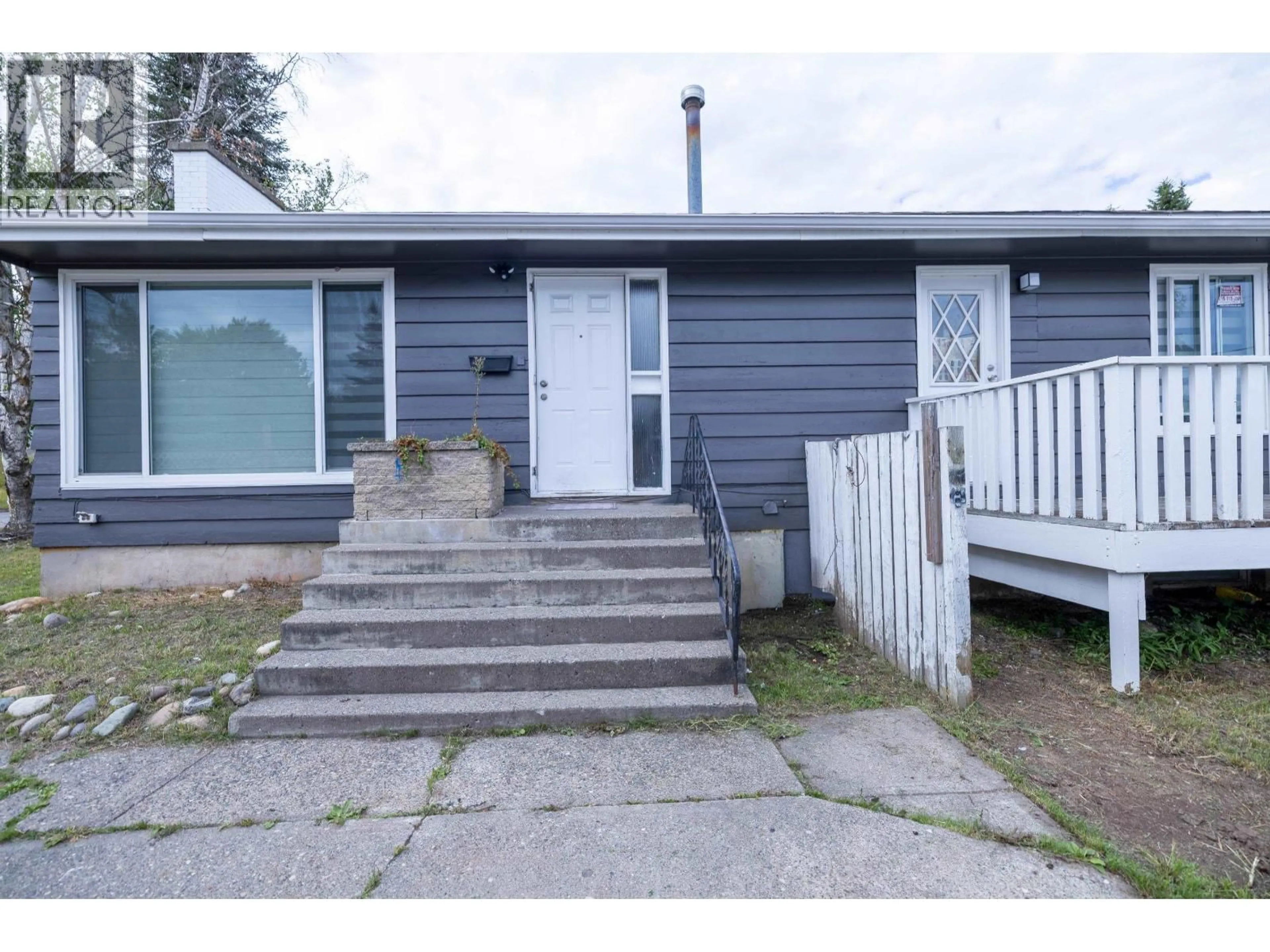 A pic from outside/outdoor area/front of a property/back of a property/a pic from drone, street for 242 LYON STREET, Prince George British Columbia V2M3K8