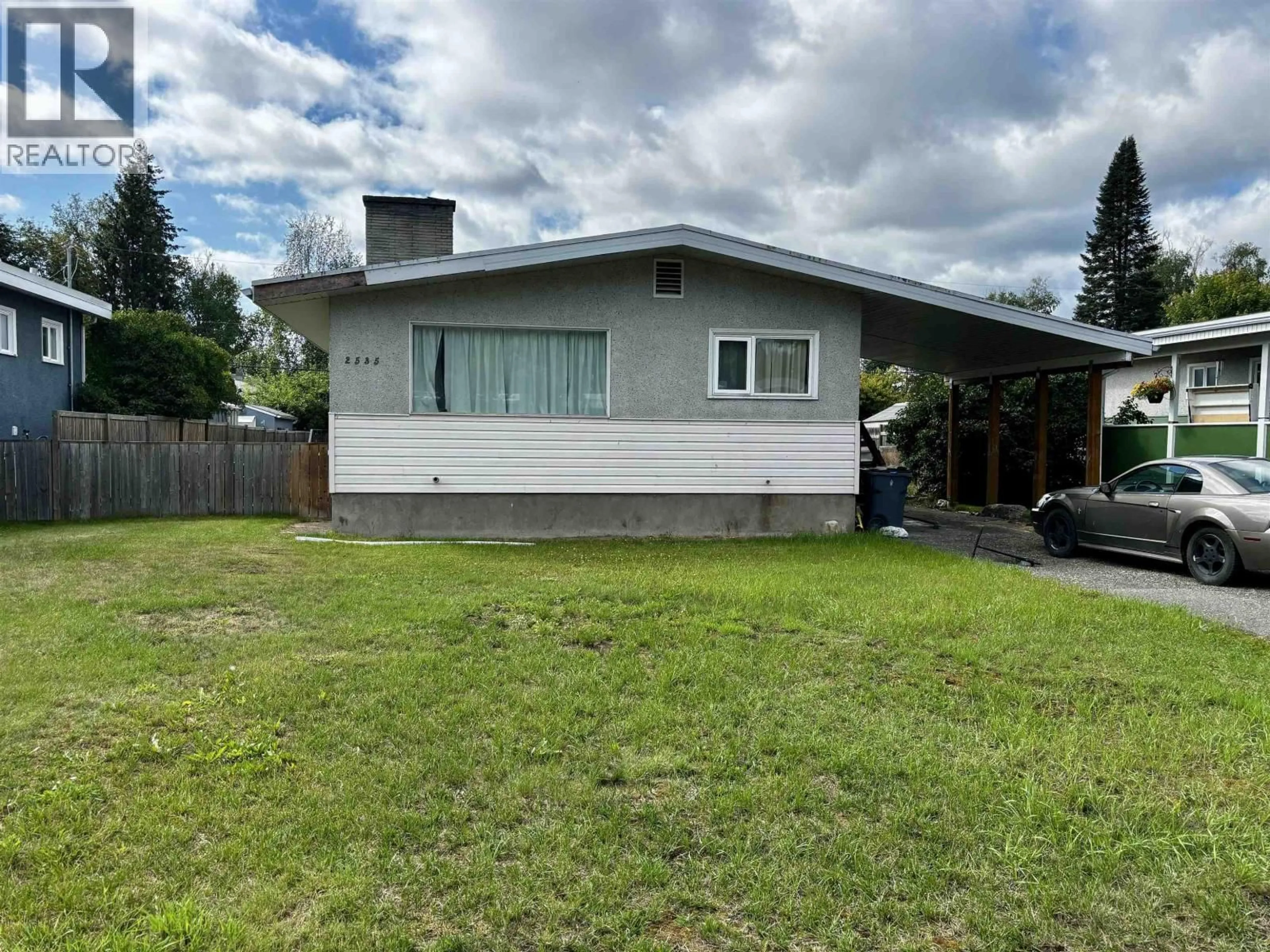 Home with vinyl exterior material, street for 2535 HAMMOND AVENUE, Prince George British Columbia V2M1A6