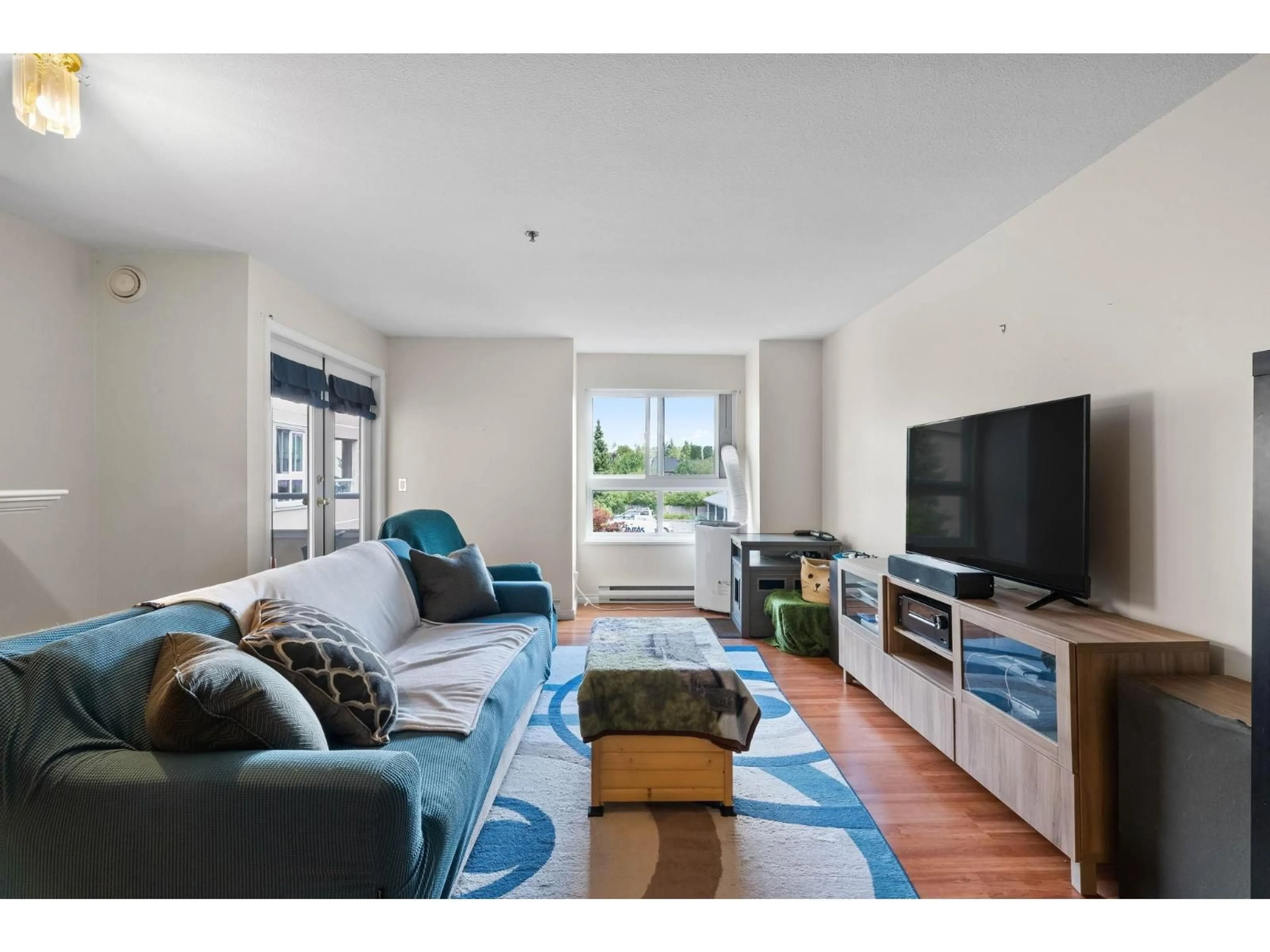 Living room with furniture, unknown for 302 - 19721 64 AVENUE, Langley British Columbia V2Y1L1
