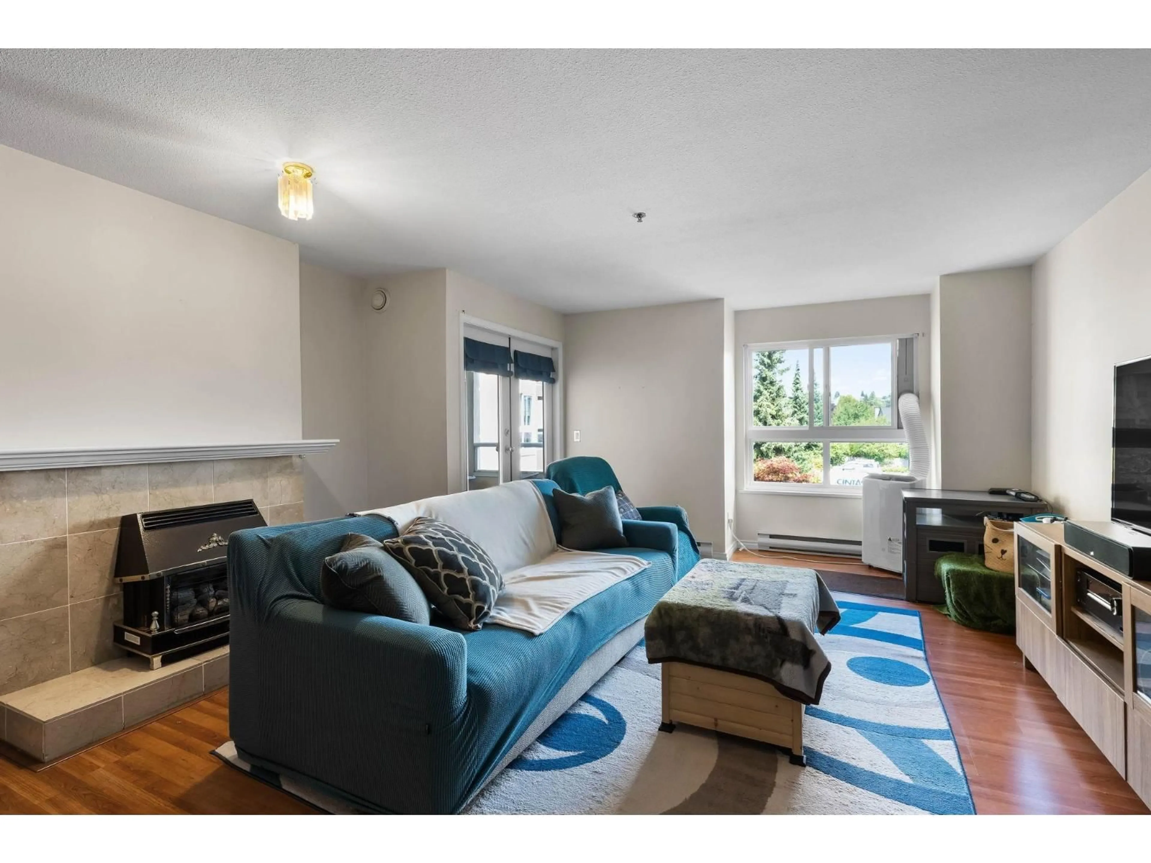 Living room with furniture, unknown for 302 - 19721 64 AVENUE, Langley British Columbia V2Y1L1