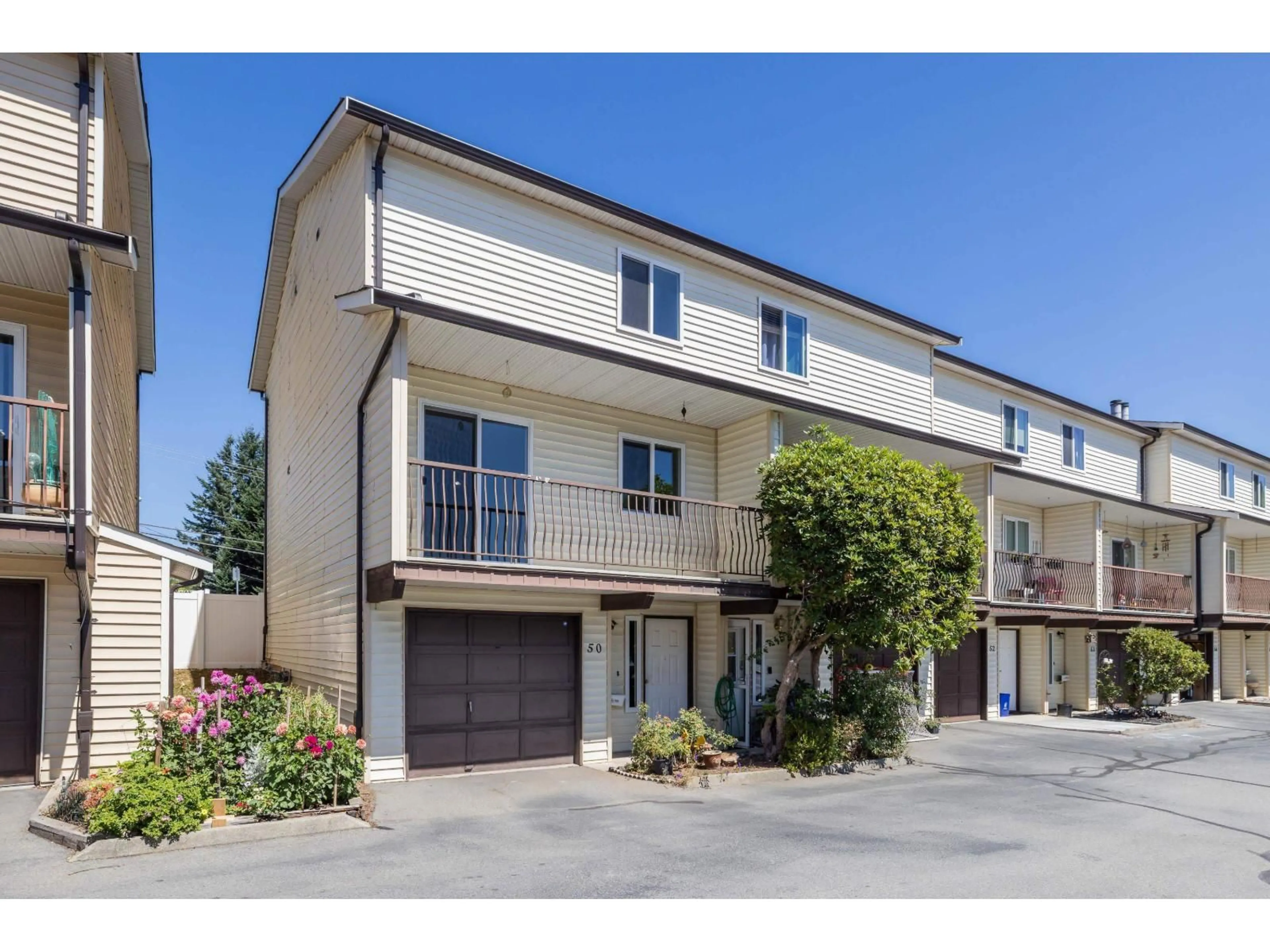 A pic from outside/outdoor area/front of a property/back of a property/a pic from drone, street for 50 - 27272 32 AVENUE, Langley British Columbia V4W3T8
