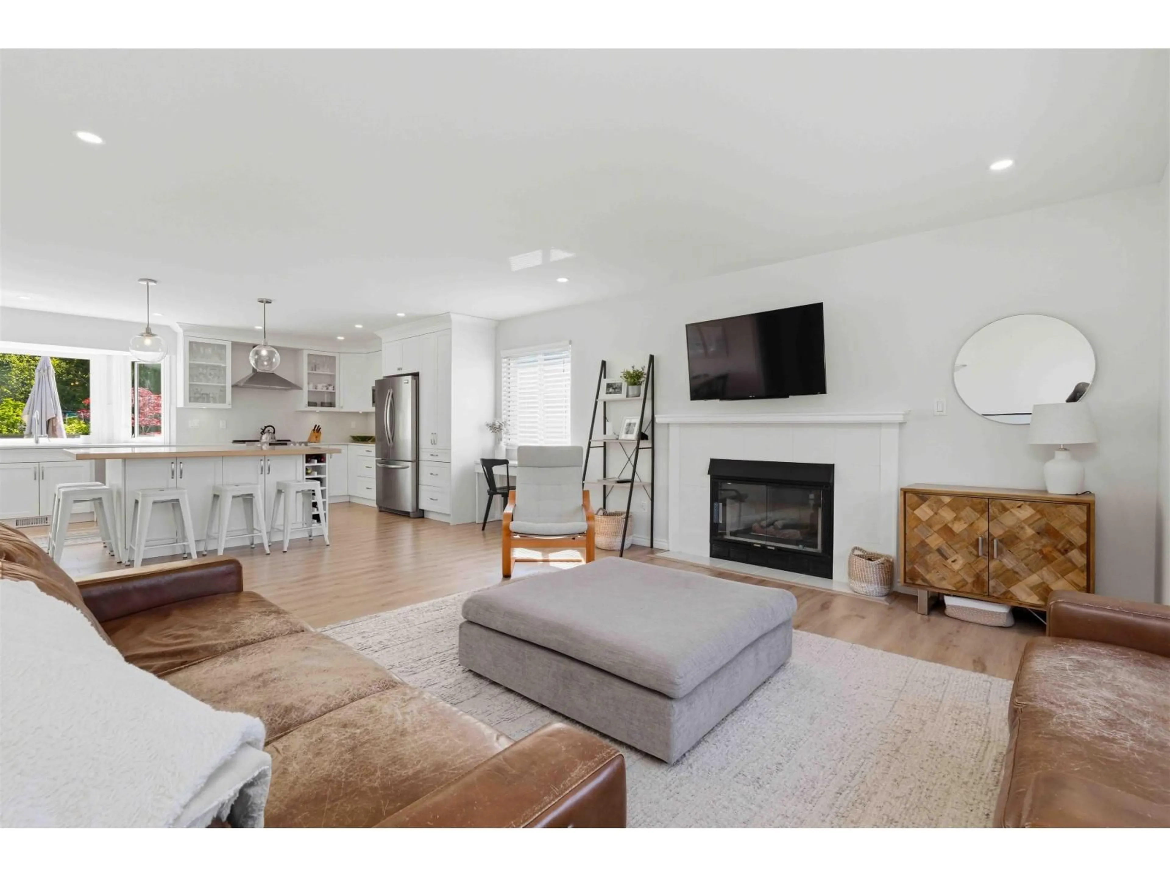 Living room with furniture, wood/laminate floor for 16162 8A AVENUE, Surrey British Columbia V4A8W7