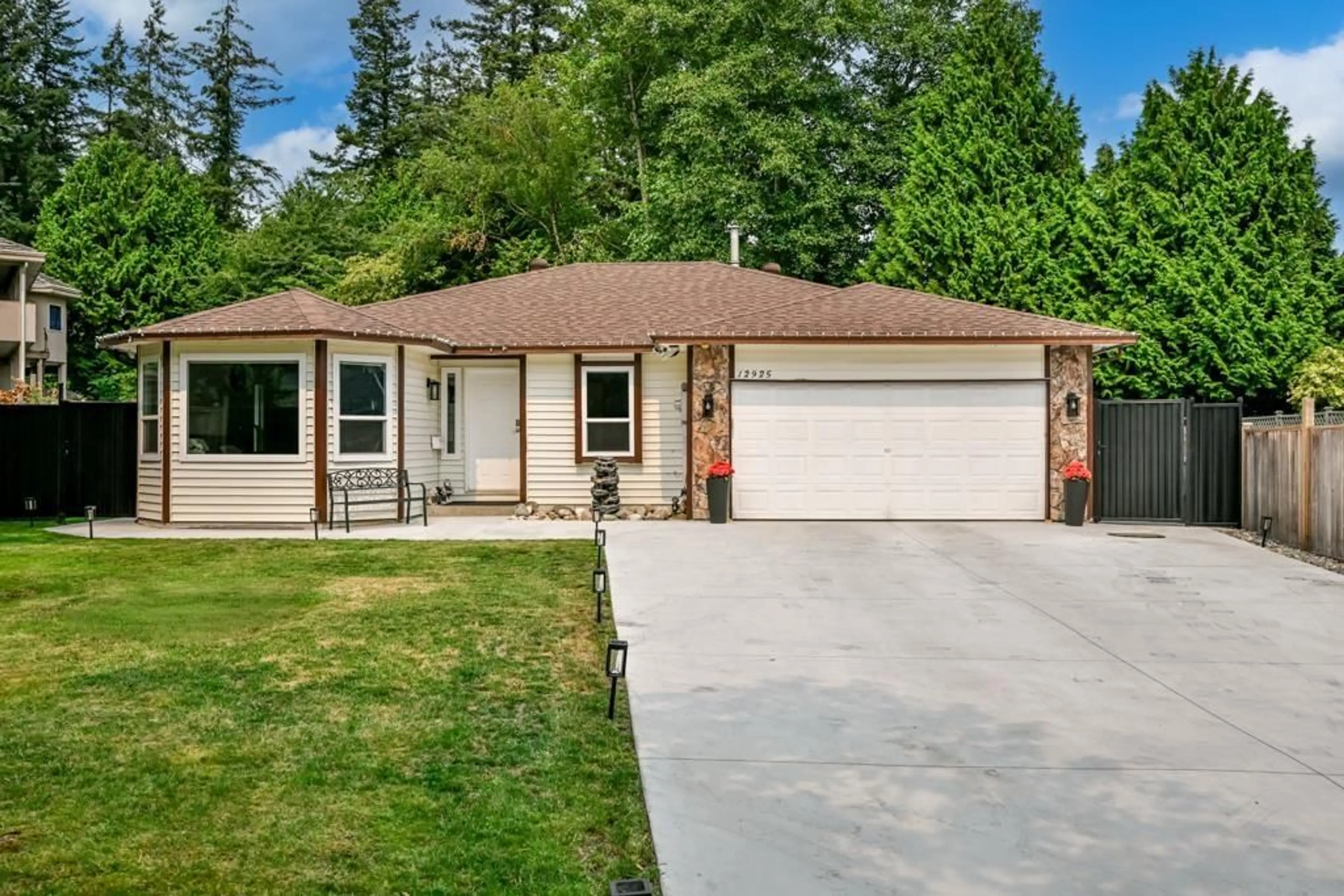 Home with vinyl exterior material, street for 12925 65 AVENUE, Surrey British Columbia V3W9H4