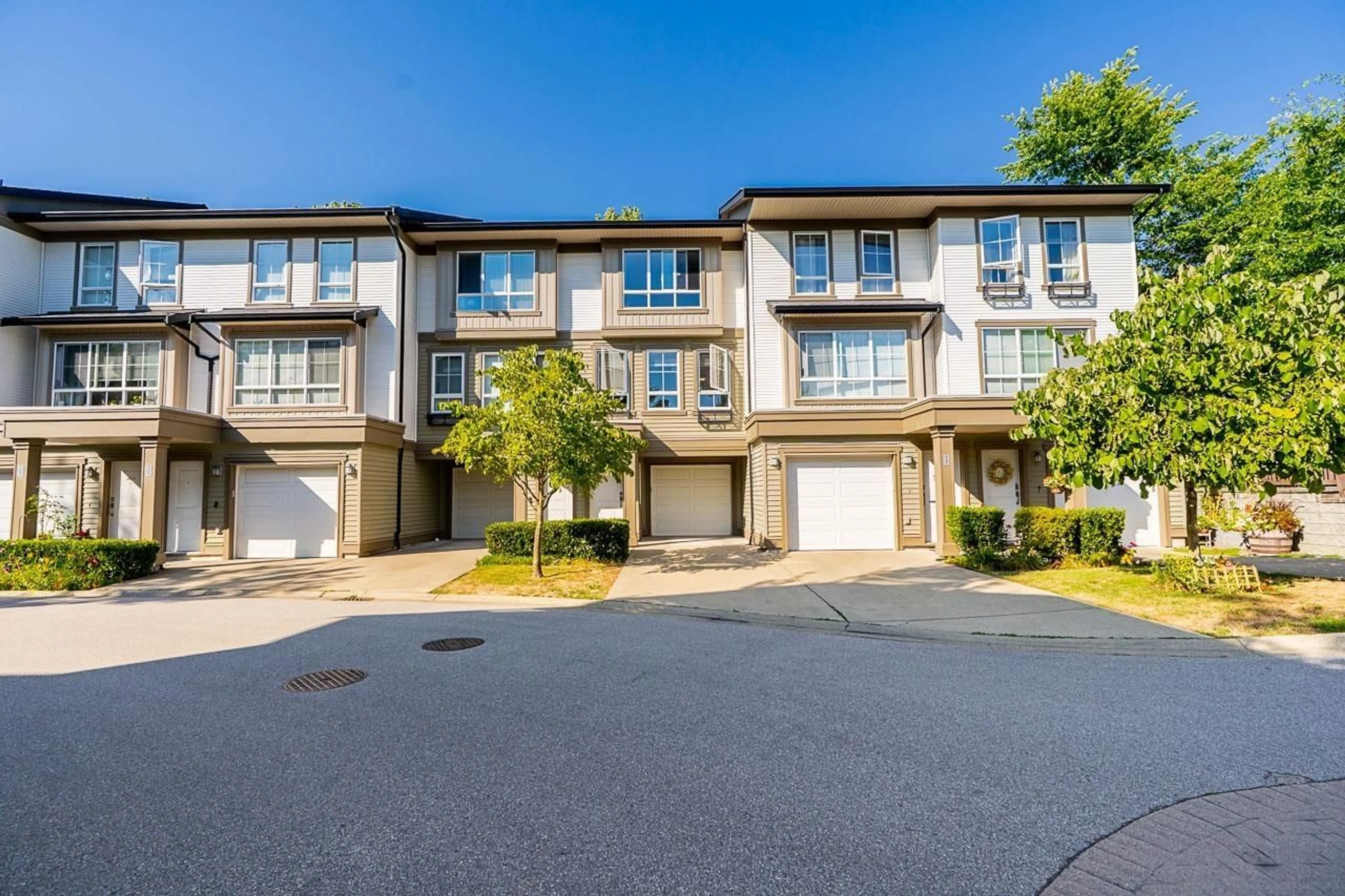 A pic from outside/outdoor area/front of a property/back of a property/a pic from drone, street for 18 - 19505 68A AVENUE, Surrey British Columbia V4N6K3
